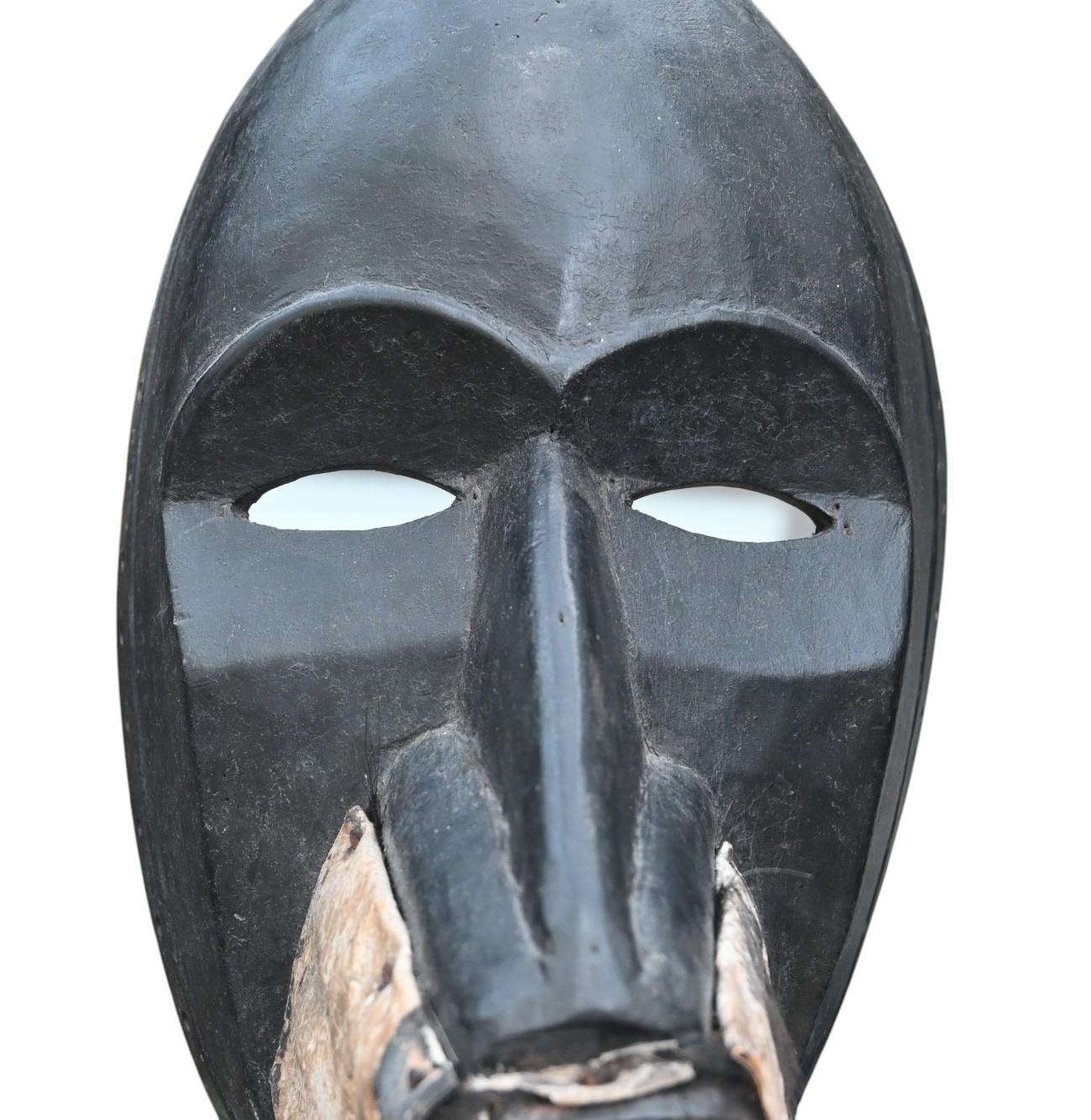 Wood African Bird Mask From The Dan Tribe, Ivory Coast, early 1900 For Sale