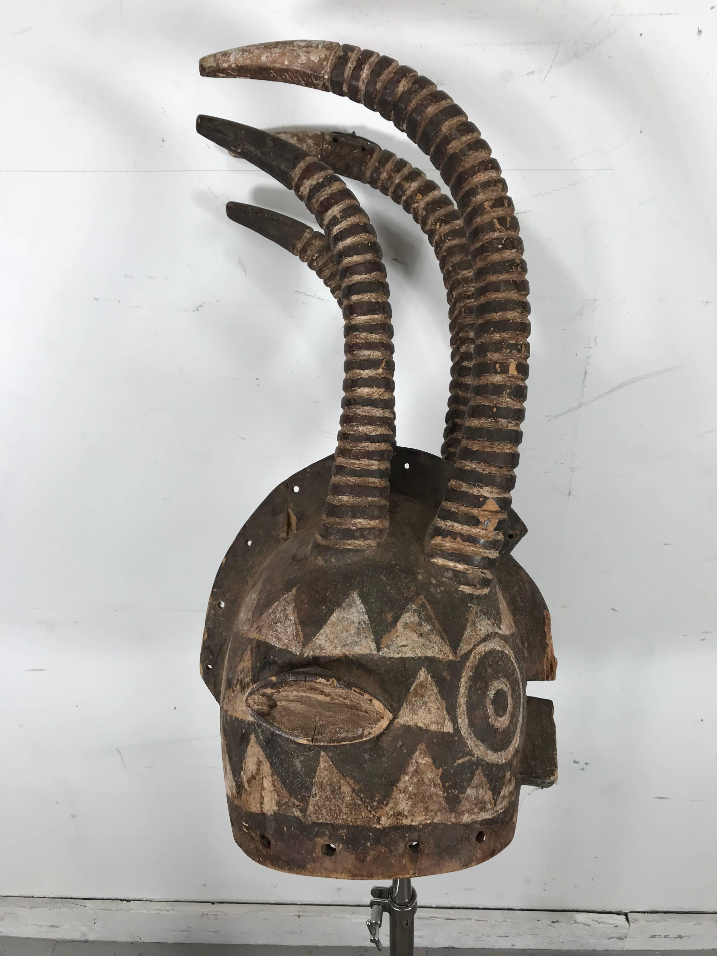 African Bobo ‘Burkina Faso’ style helmet mask with four textured horns.