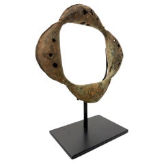 African Bronze Currency, Geometric Motifs, Well Patinaed, on a Display Stand