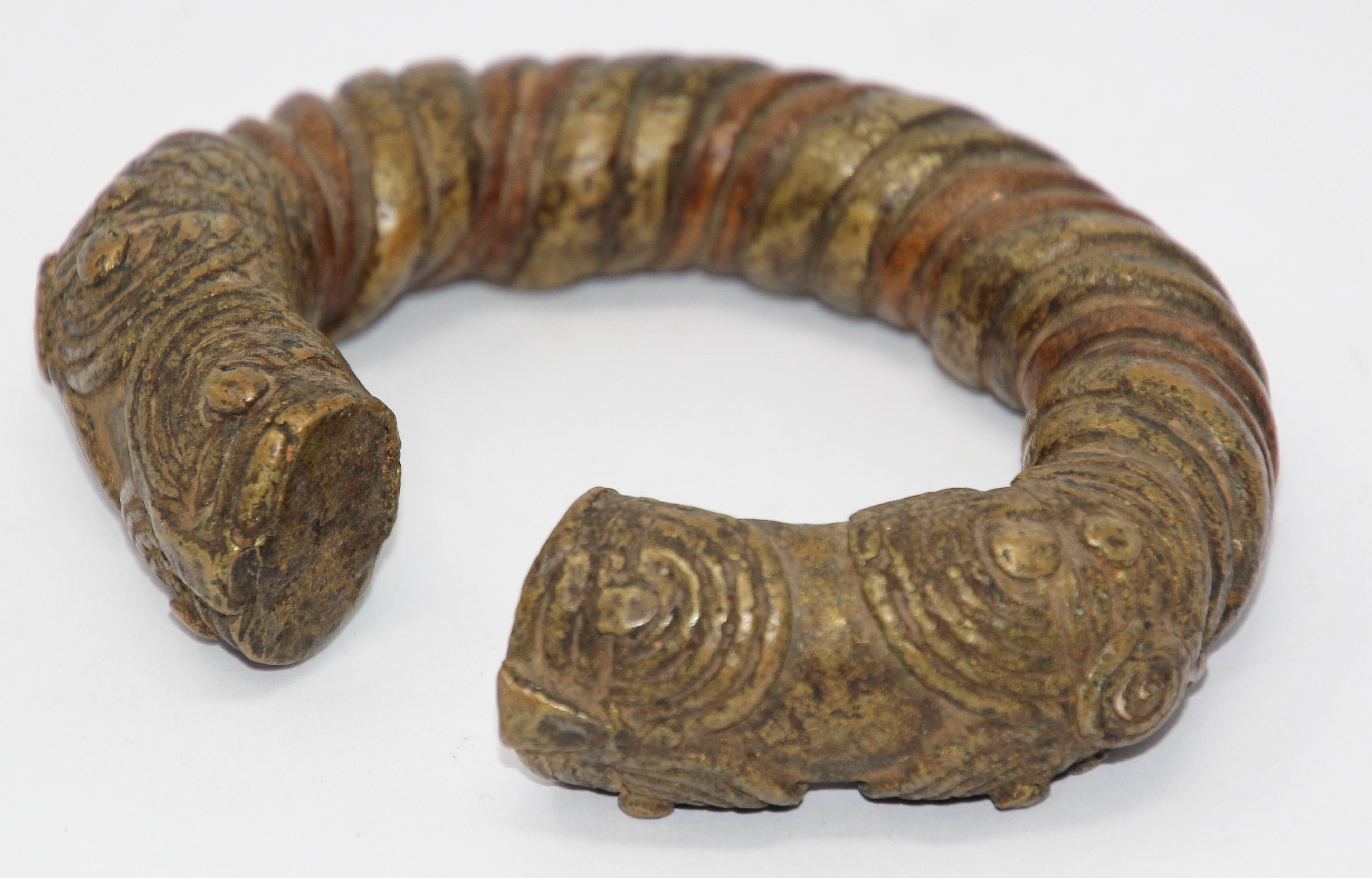 Ancient African bronze Yoruba tribes Nigeria Manilla Bronze Trade Currency Bracelet.
An African manilla trade currency from the Yoruba People of Nigeria, West Africa.
Bronze bracelets (properly called Manillas) were worn both for personal adornment