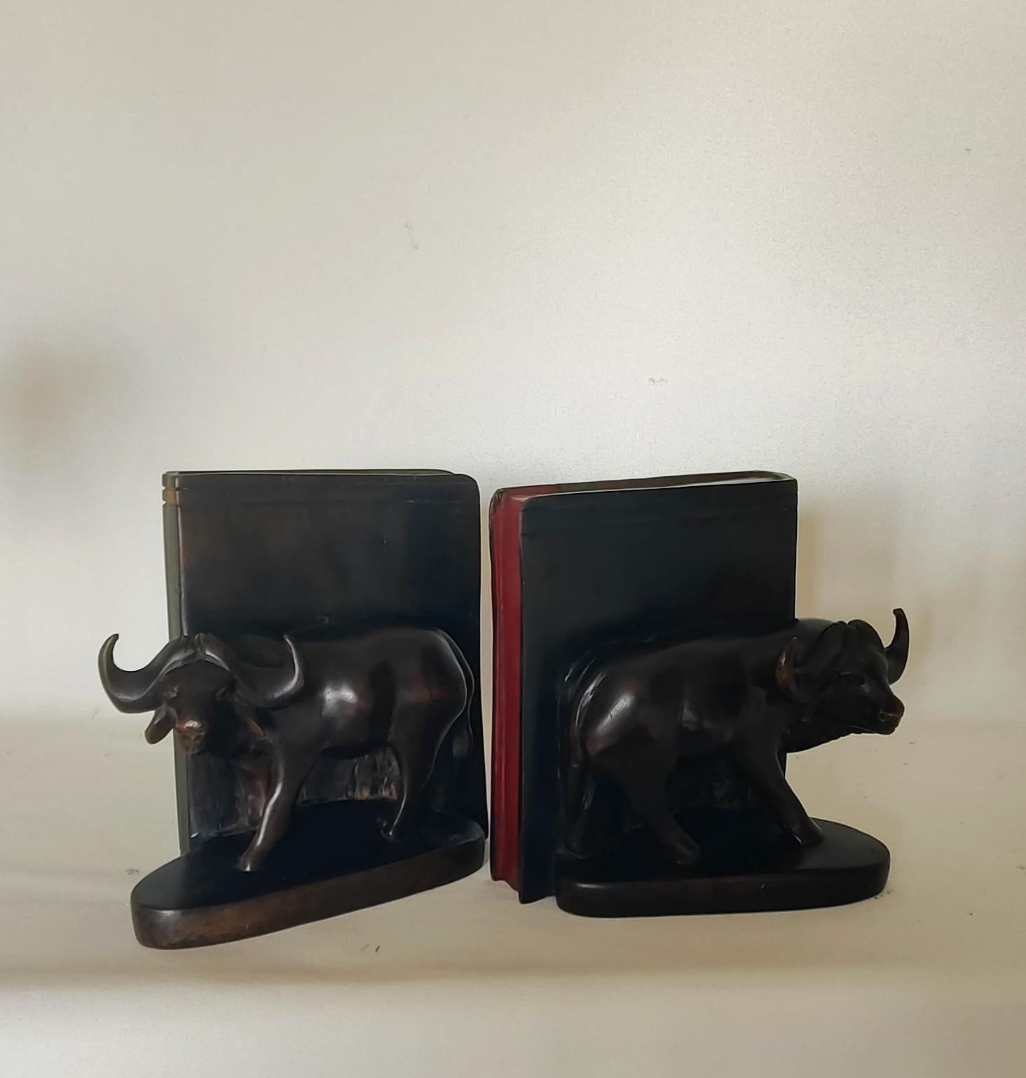 Hand-Crafted African Buffallo trópical wood bookends For Sale