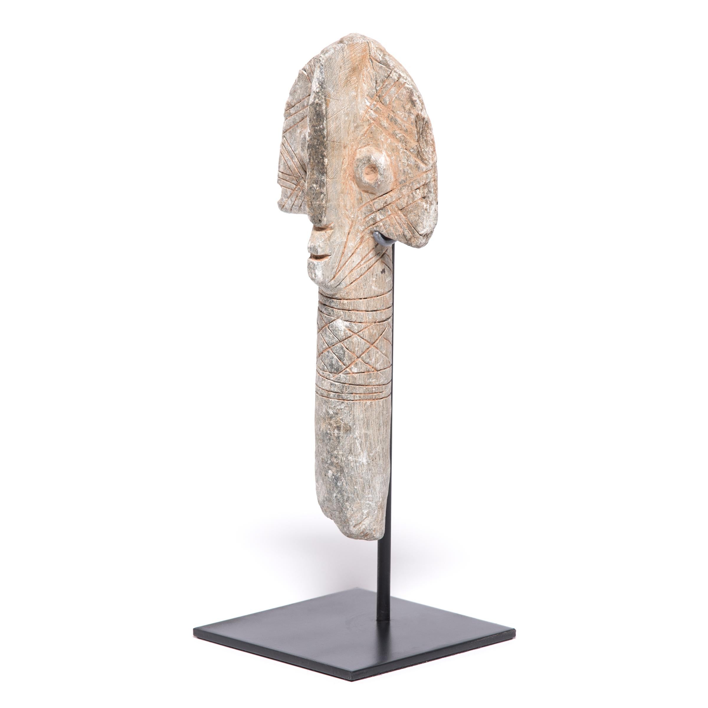 This abstract stone sculpture is a funerary marker of the Bura people of the Niger/Mali region. Little is known about the Bura civilization (c. 200 to 1000 AD), but it shares many of its artistic traditions with other pre-colonial African groups