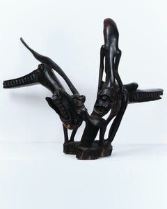 African, Carved abstract animal sculpture