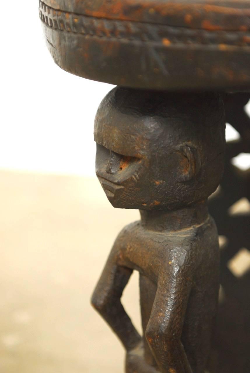 African Carved Tribal Stool with Figural Legs In Distressed Condition In Rio Vista, CA