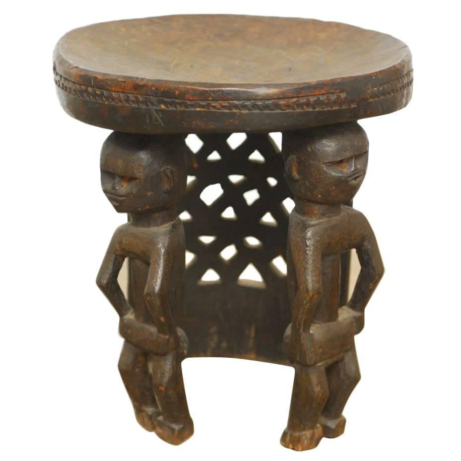 African Carved Tribal Stool with Figural Legs