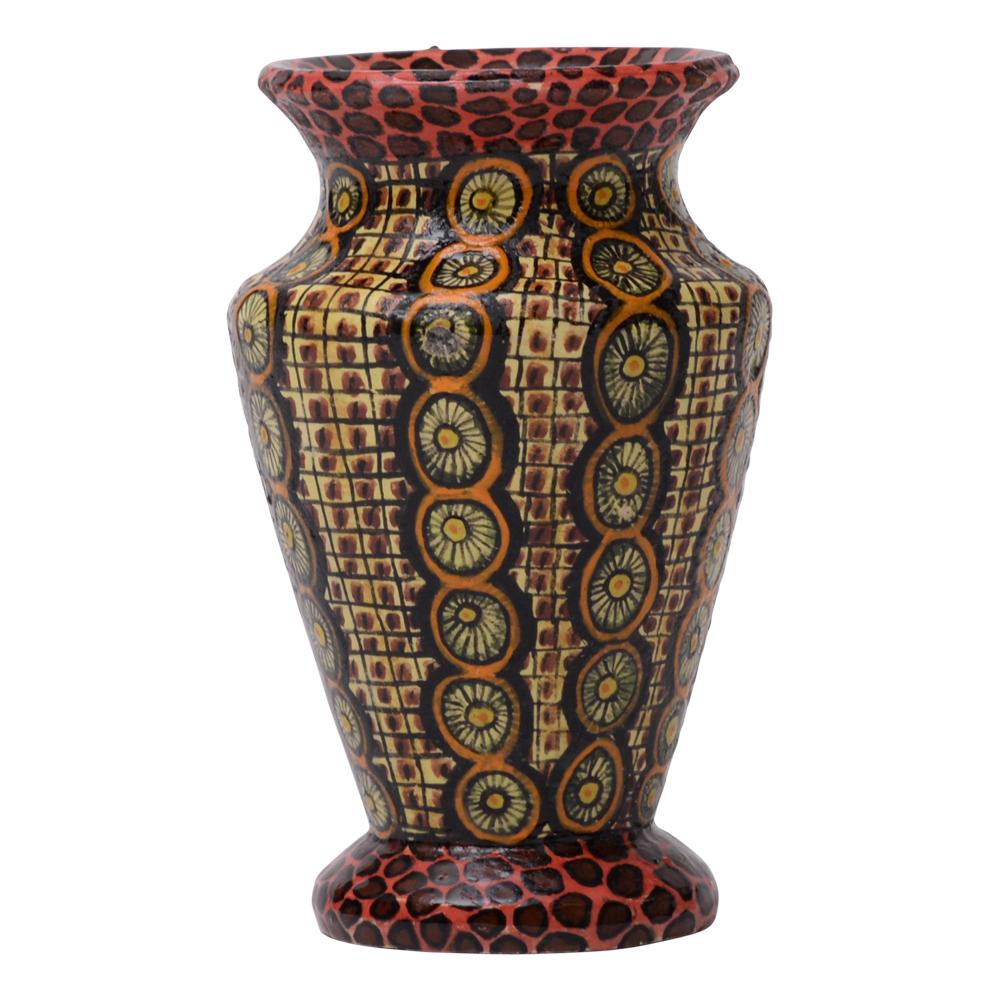 Introducing the Hand-Painted Design Vase by Senzo Duma Ceramic Arts, directly from South Africa. Handcrafted by Senzo Duma and painted by Zinhle Nene, this 8-inch vase features intricate African tribal patterns in earthy browns, fiery reds, and