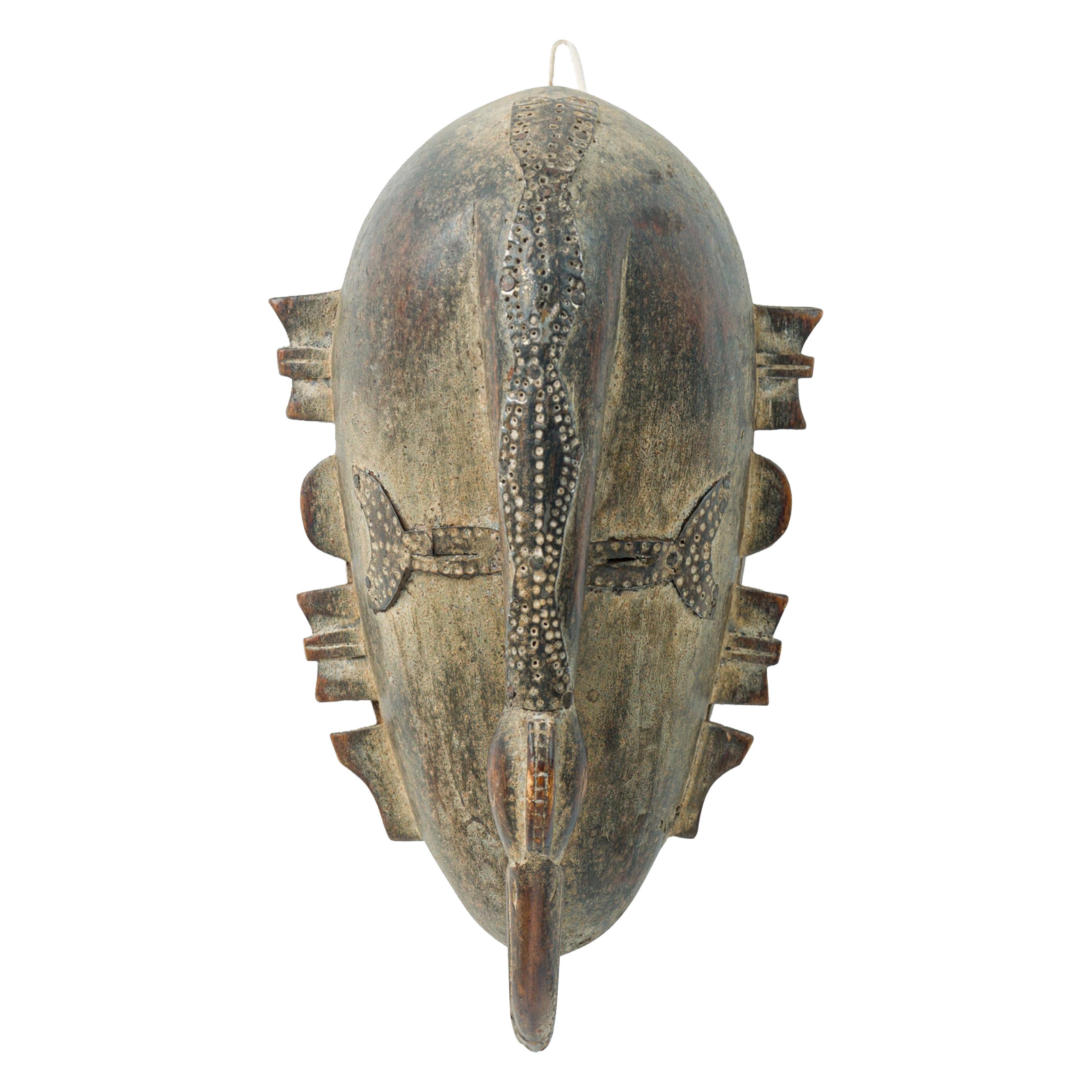 African Cote dVoire 20th Century Wood 
Brass Do Society Ligbi Hornbill Mask For Sale