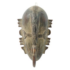 African Cote dVoire 20th Century Wood 
Brass Do Society Ligbi Hornbill Mask