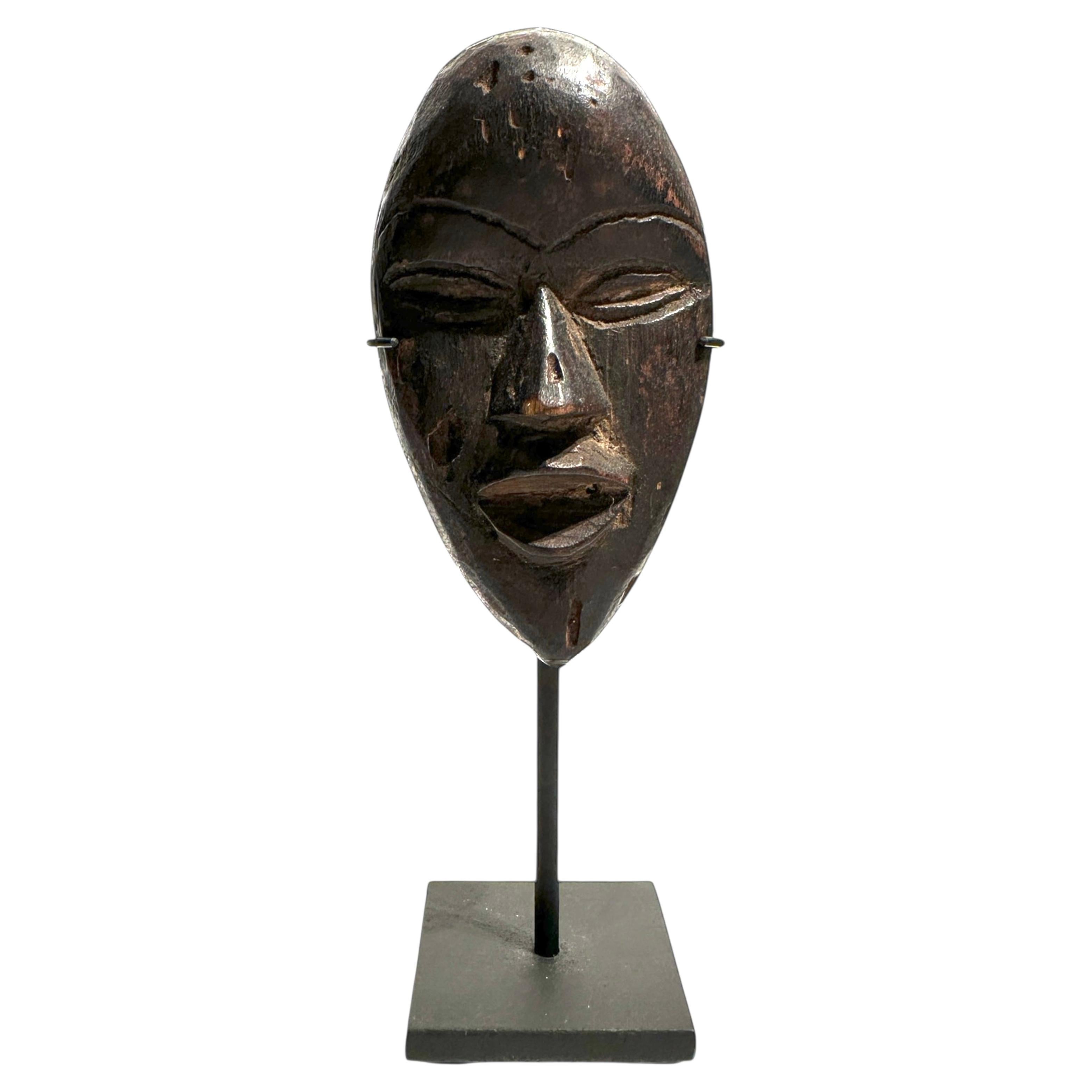 Masque familial African Dan Passport - Masque en bois sculpté d
Afrique de l
Ouest