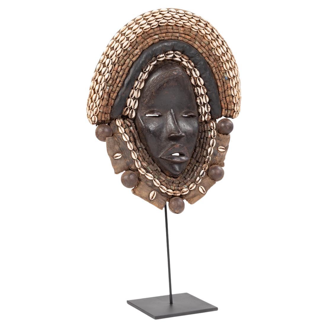 Tribal African Dan Yakuba Guard Mask Small Shells and Bells from the Ivory Coast 1970s For Sale