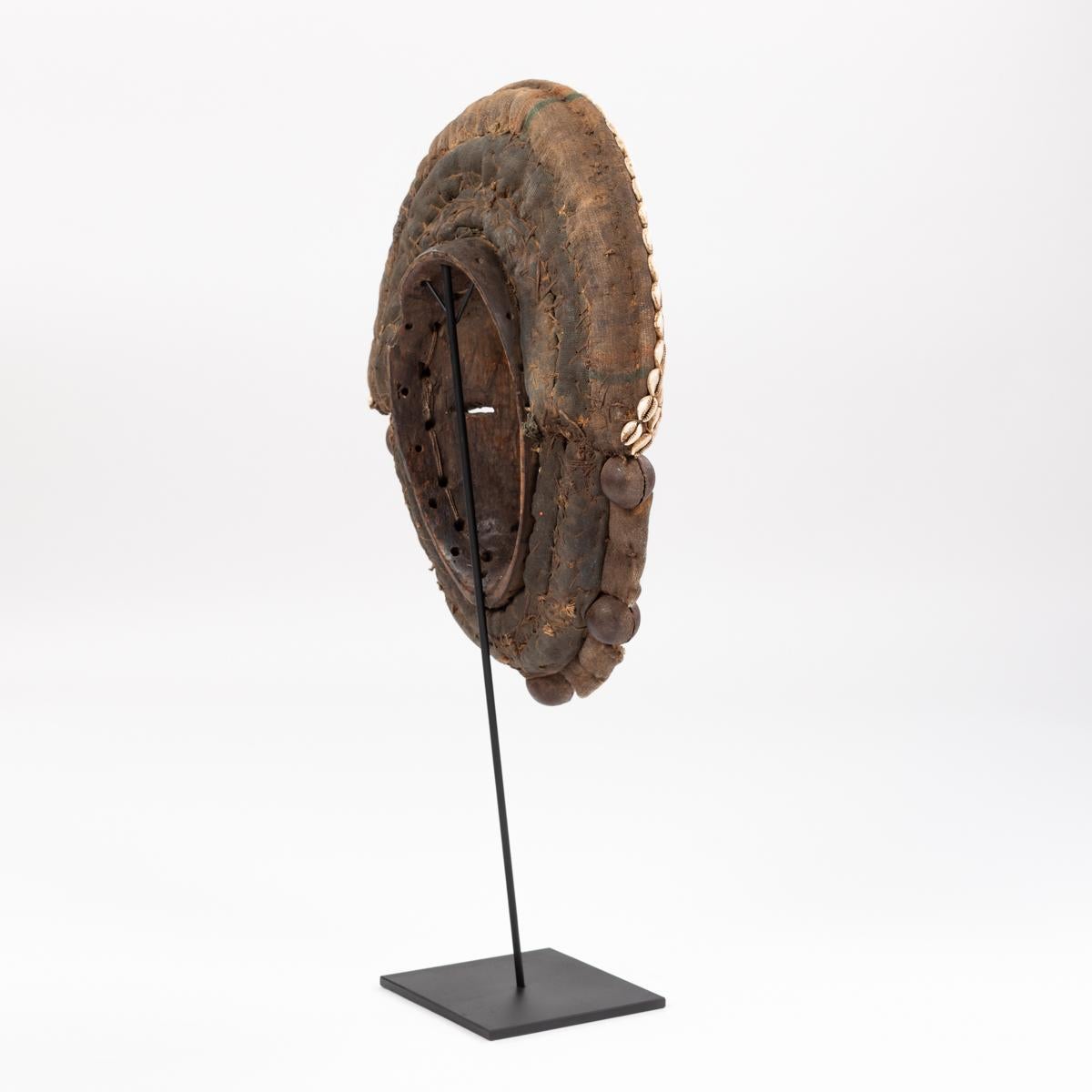Hand-Carved African Dan Yakuba Guard Mask Small Shells and Bells from the Ivory Coast 1970s For Sale