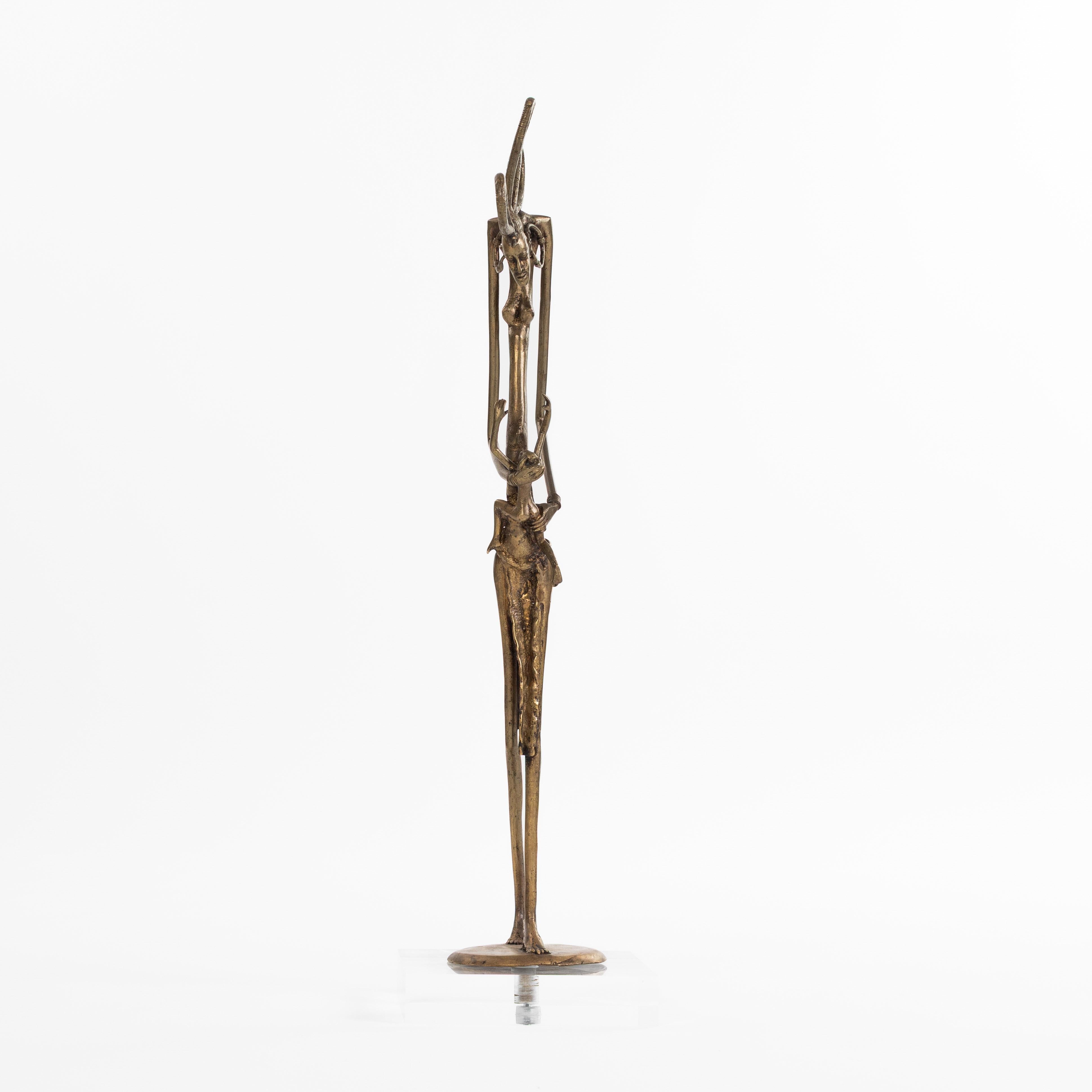 Burkinabé Figure tribale africaine en bronze Dogon 