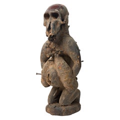 African D.R. Congo 20th Century Carved Wood Nkisi Baboon Nail Fetish Figure
