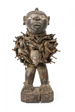 African D.R. Congo 20th Century Carved Wood Nkisi Male Nail Fetish Figure