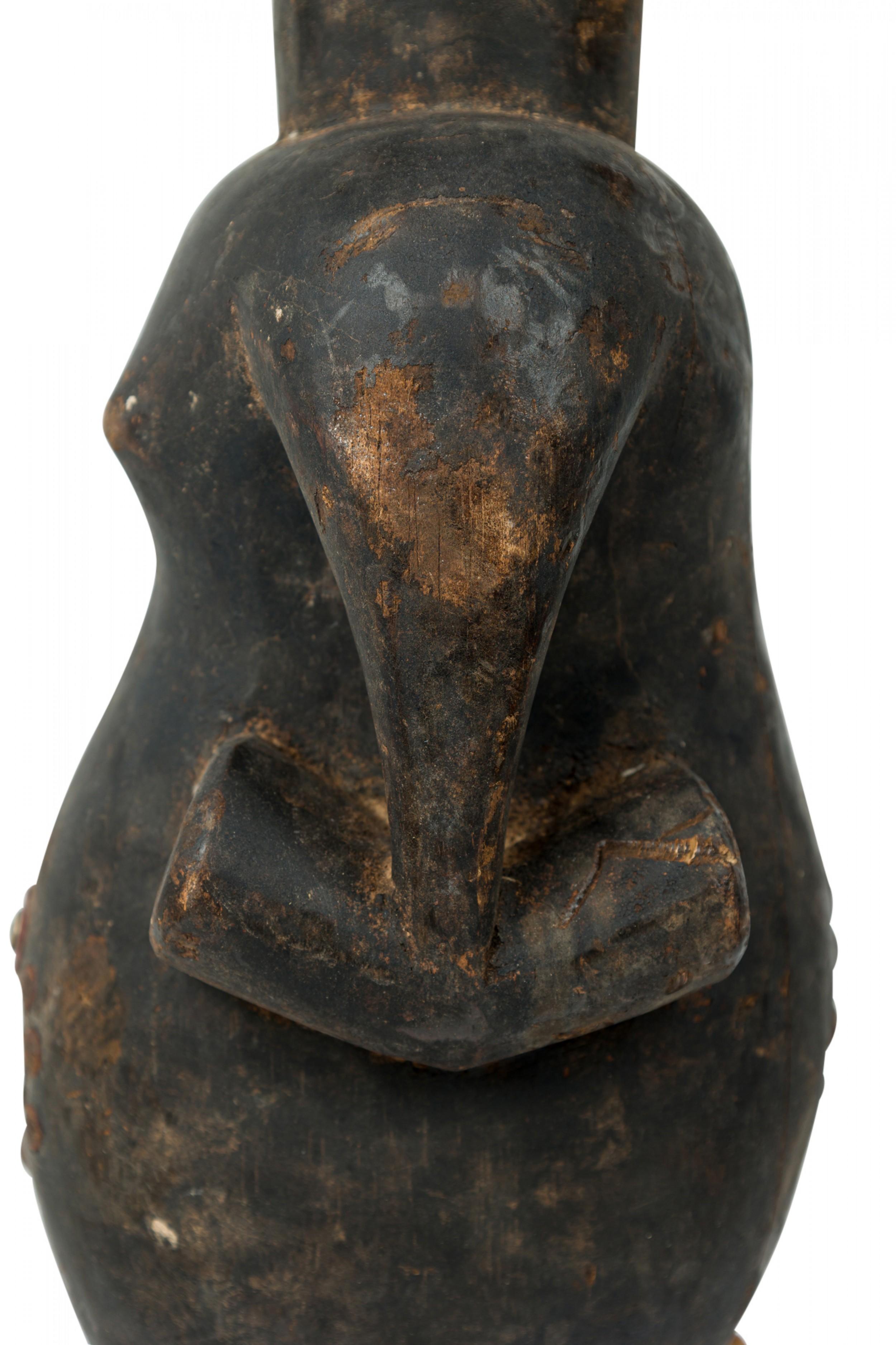 Afrikanisch D.R. Kongo 20. Jahrhundert geschnitzte Songye 2-köpfige Janus Figur im Angebot 5