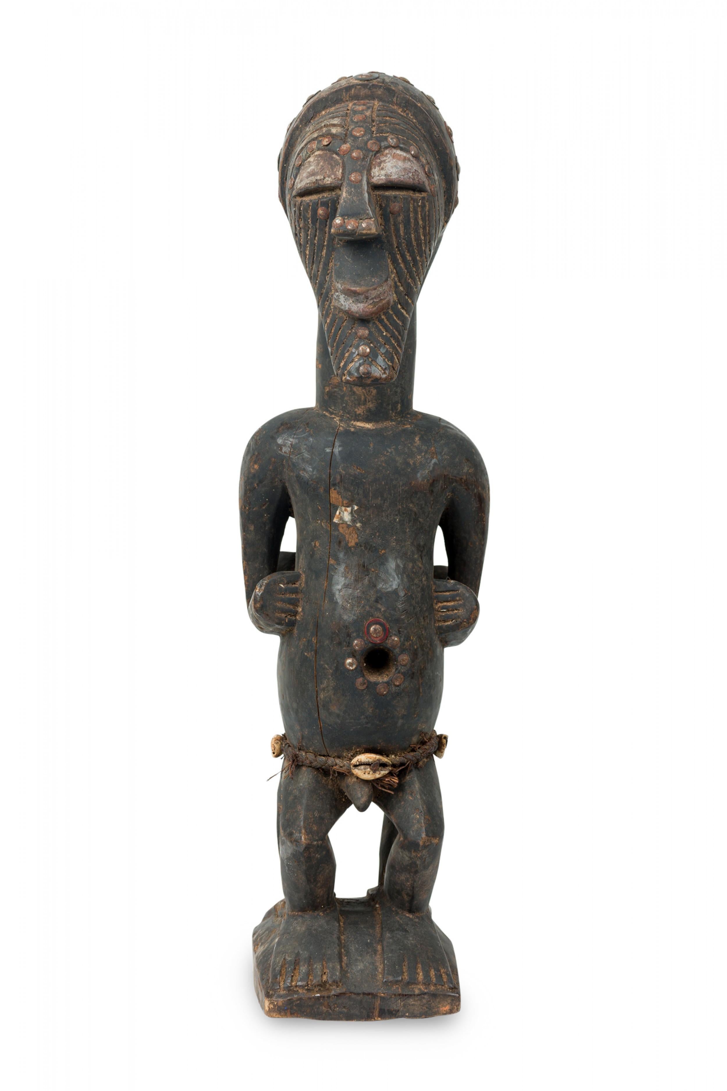 Afrikanisch D.R. Kongo 20. Jahrhundert geschnitzte Songye 2-köpfige Janus Figur (Geschnitzt) im Angebot