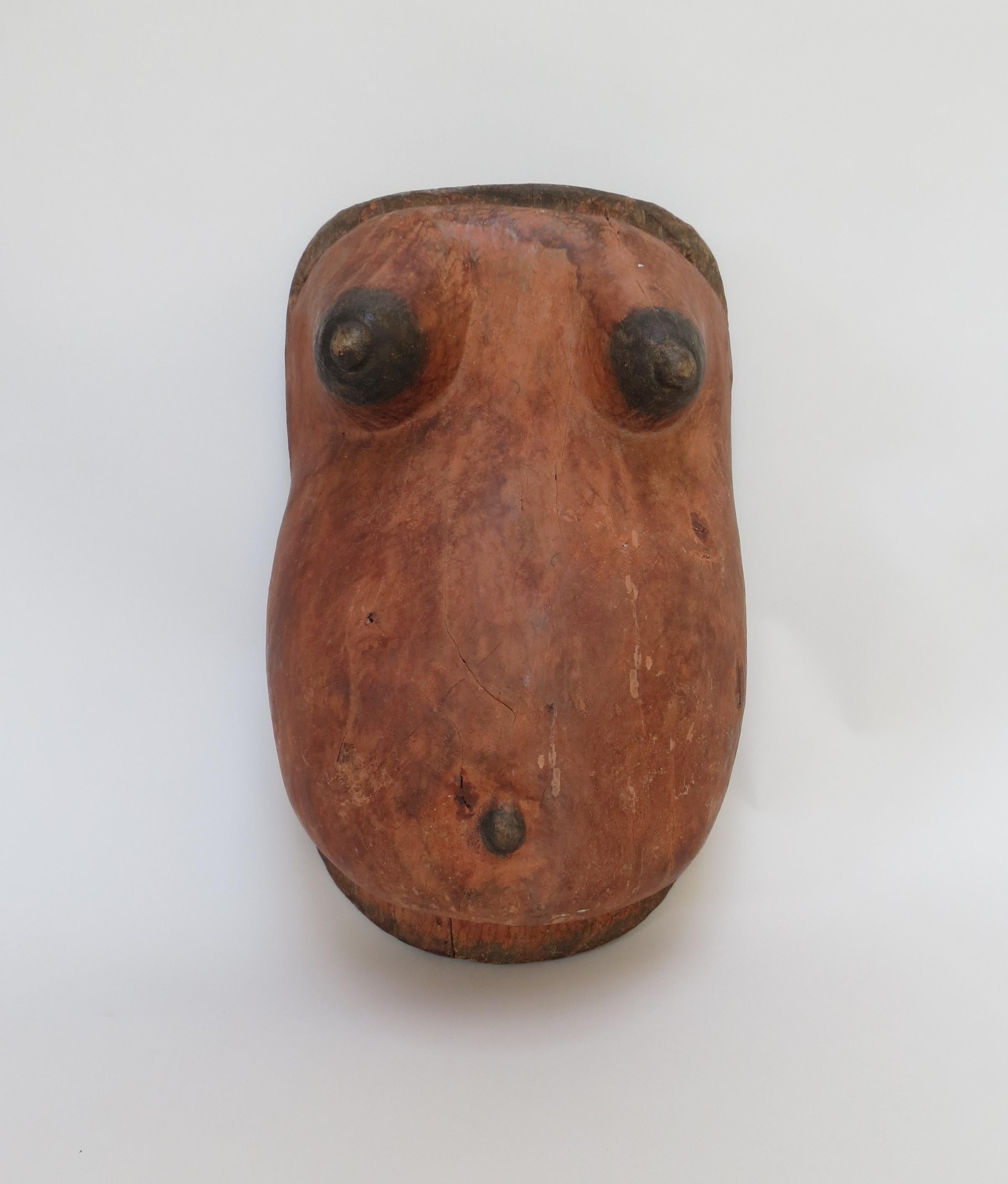 A wonderful fertility body mask dating from the mid-20th century. Hand sculptured from wood and painted in an ochre pigment paint. A great wall hanging.
Fertility Masks were worn by the young males of the Tribe during ceremonies.
Measures: 30cm W