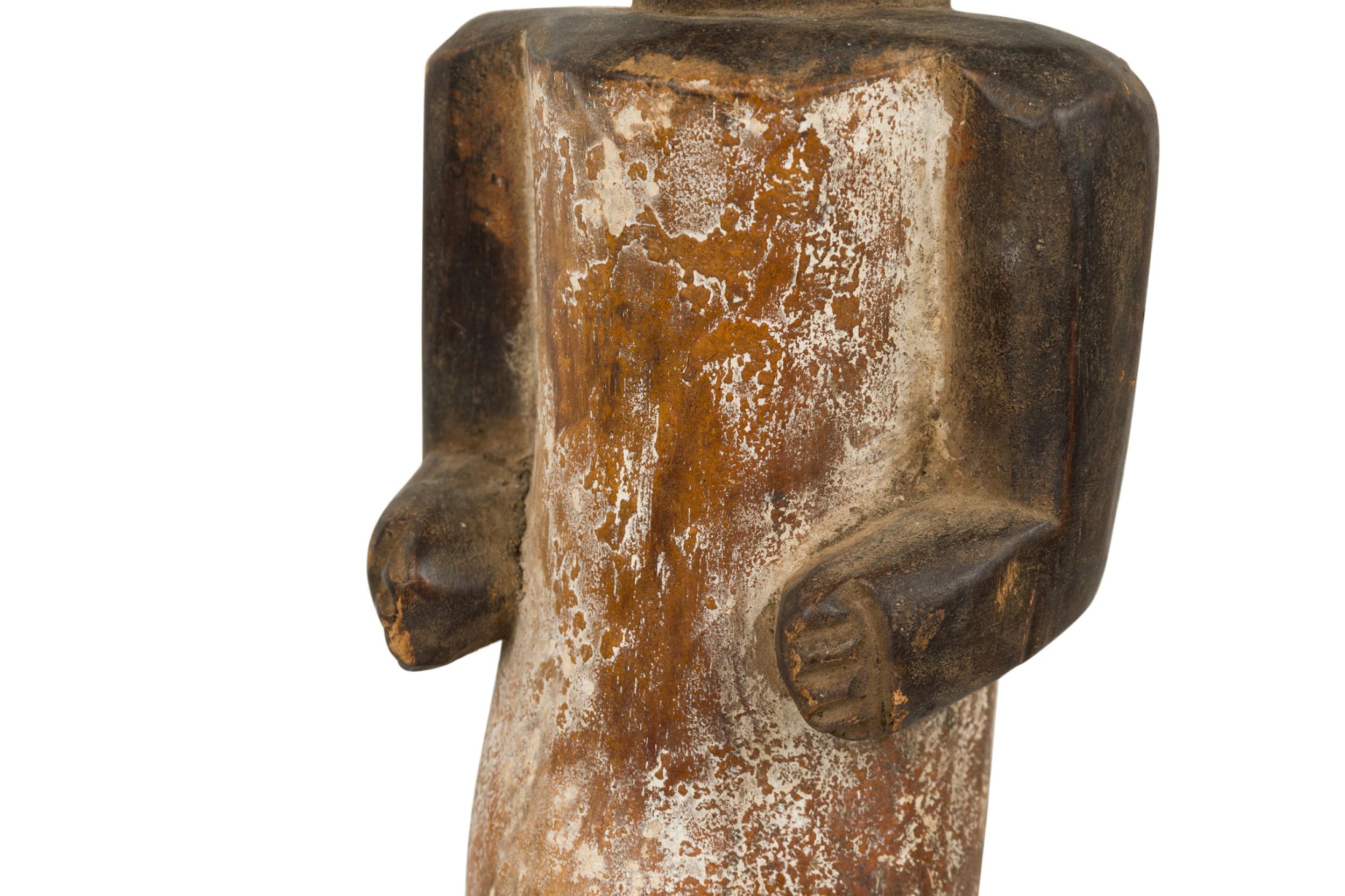 20ième siècle Gabon africain Fin du 20e siècle Figure reliquaire masculine sculptée à la main en vente