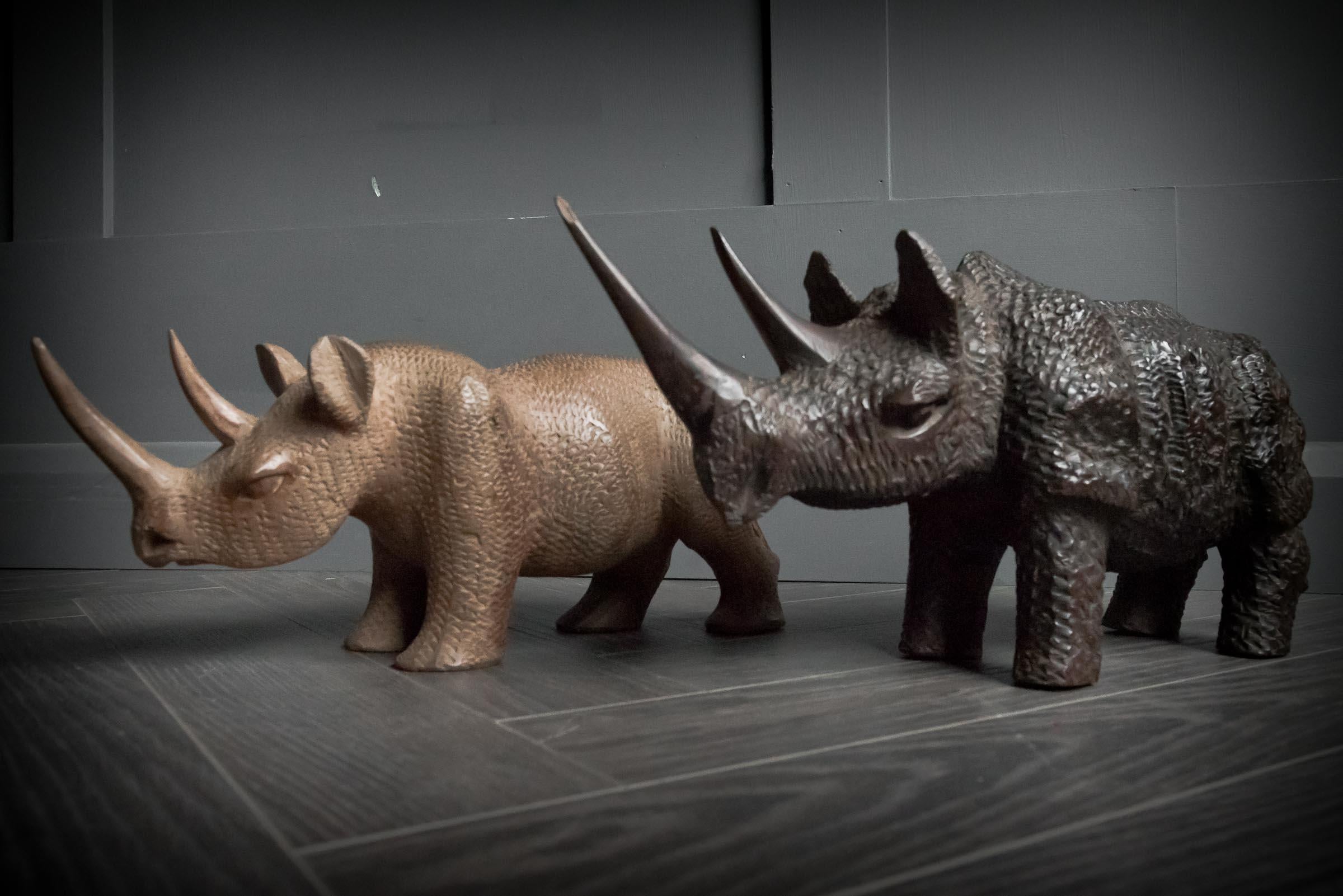African Hand Carved Pair of Black and White Rhinos In Good Condition For Sale In Alton, GB