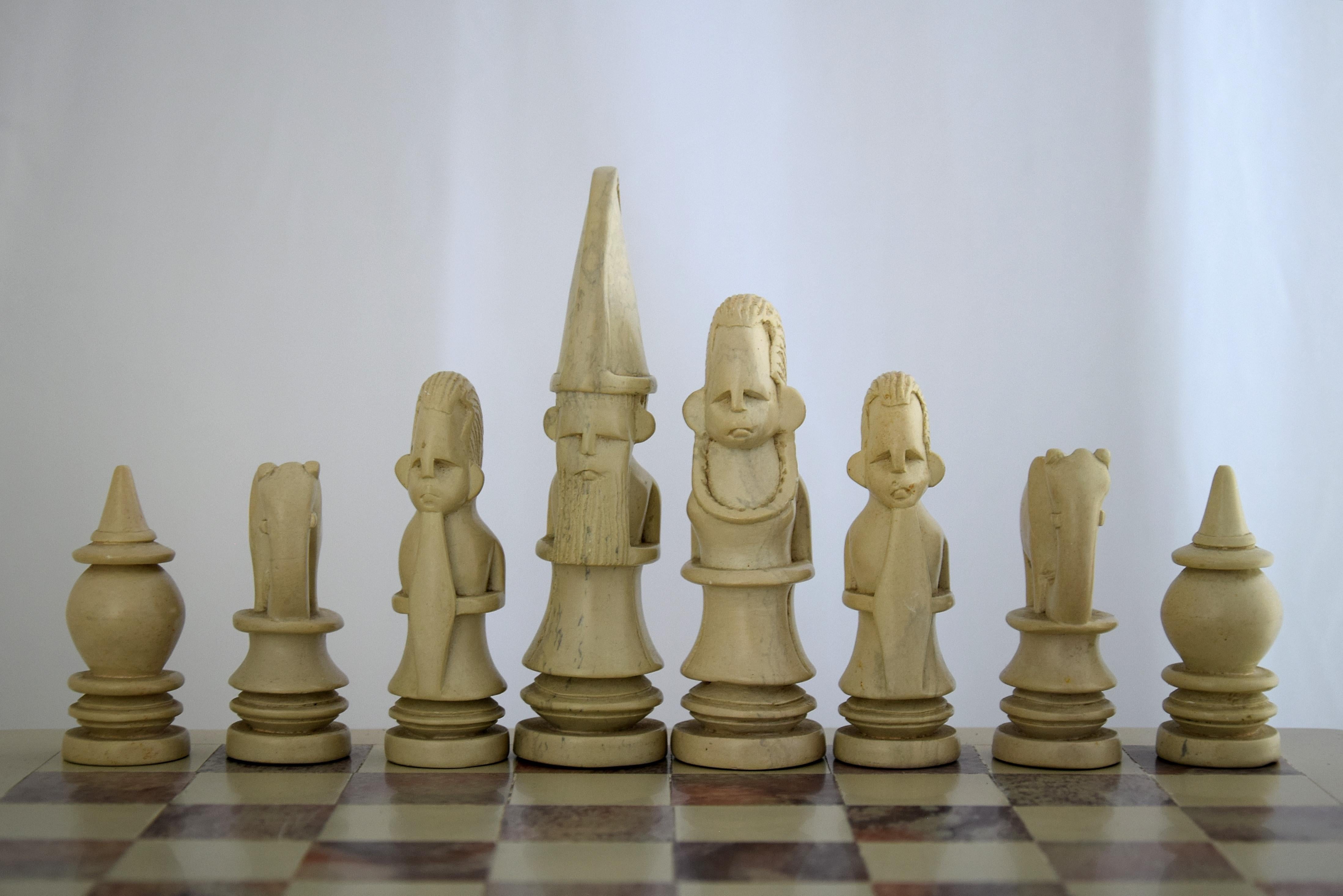 This unique 1980 stone hand cut chess set was a gift from the government of Kenya to the Italian ambassador to South Africa, the late mister Vincenzo Schioppa. The set is in great condition as can be seen in the images. The chess board was broken