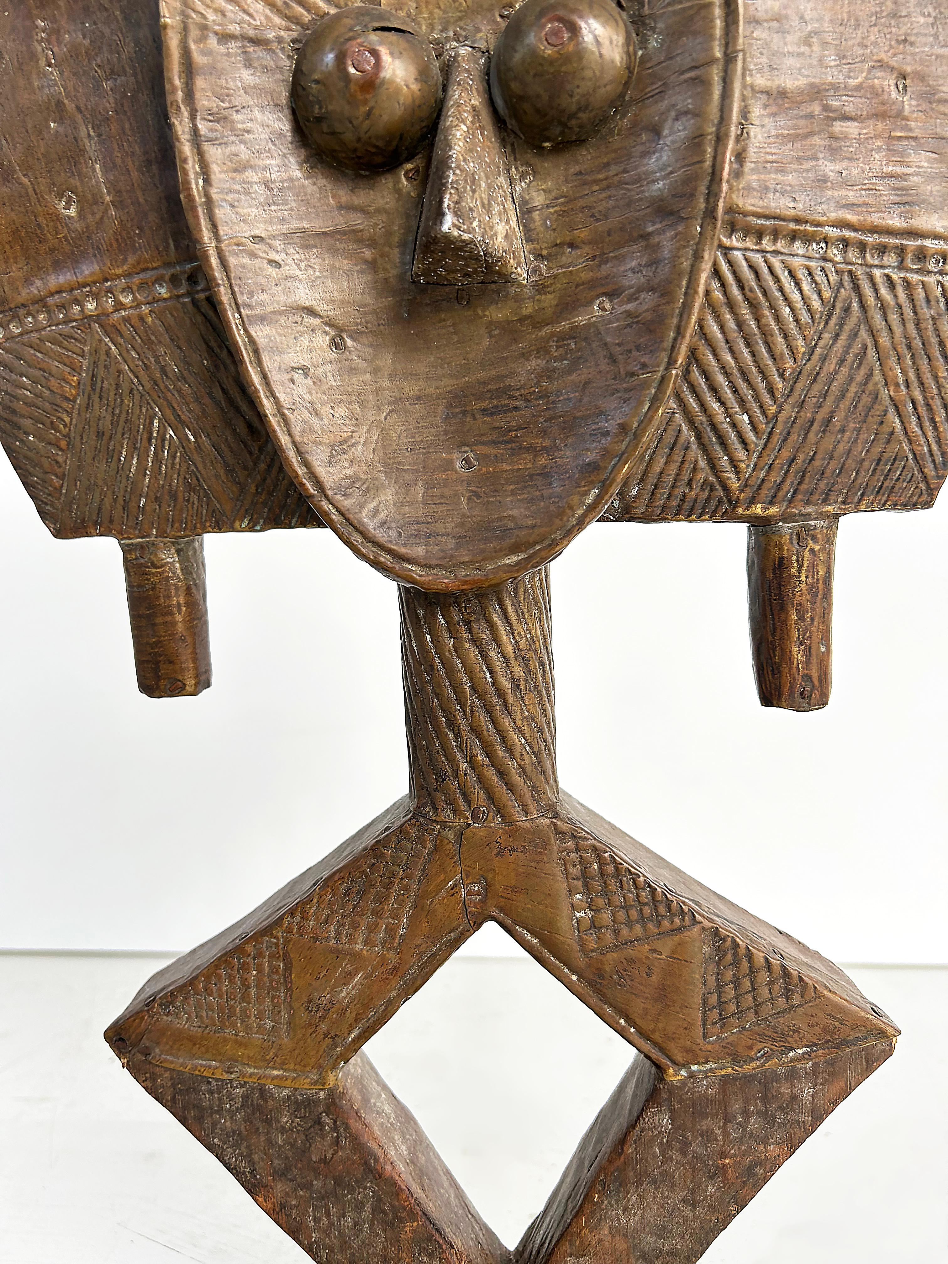 African Hand-Carved Wood Decorative Figurative Reliquary from Gabon 20th Century

Offered for sale is an African hand-carved wood decorative reliquary from Gabon dating to the mid-late 20th century.