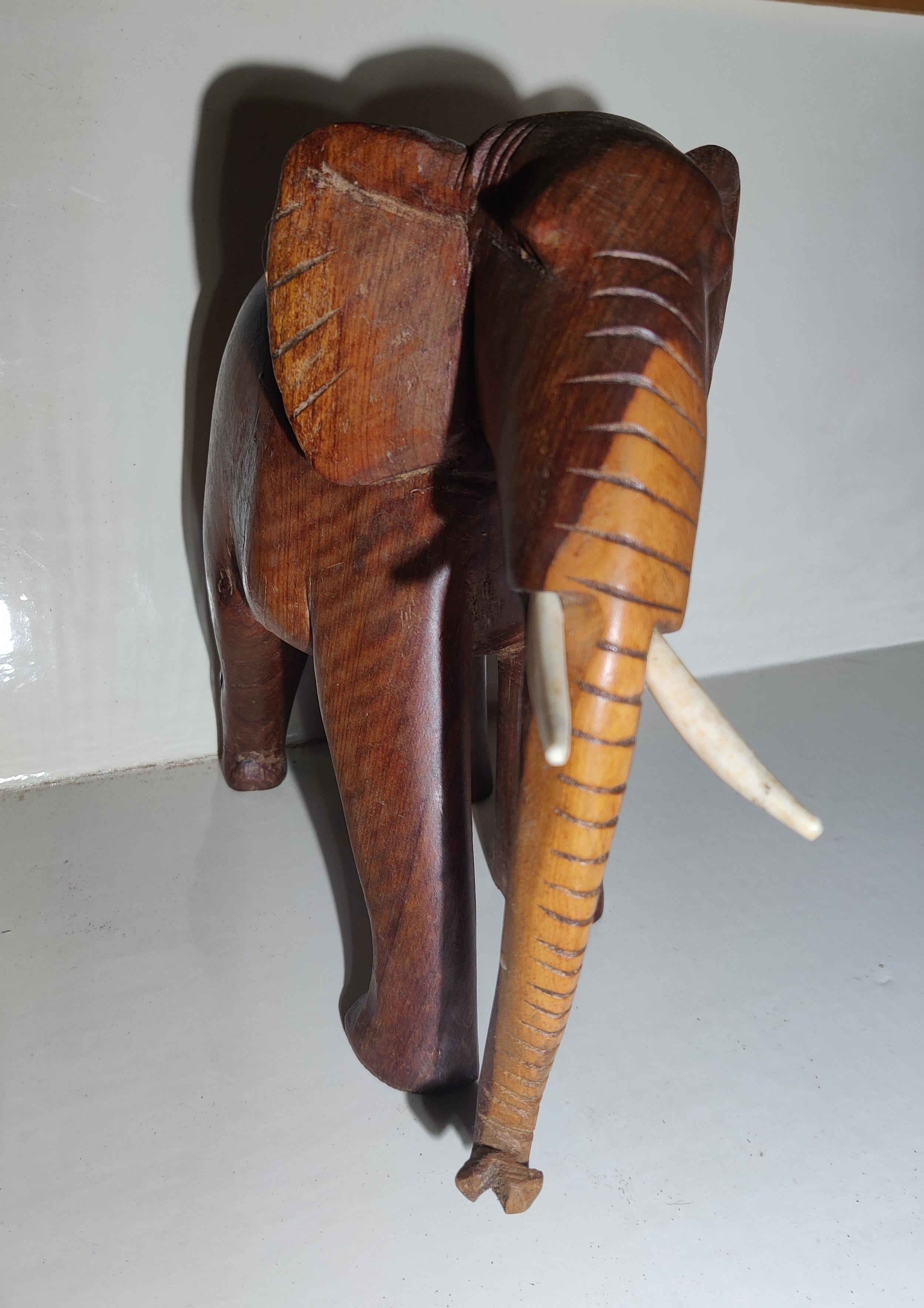 African Heavy Wood Carved Elephant with Tusks For Sale 7