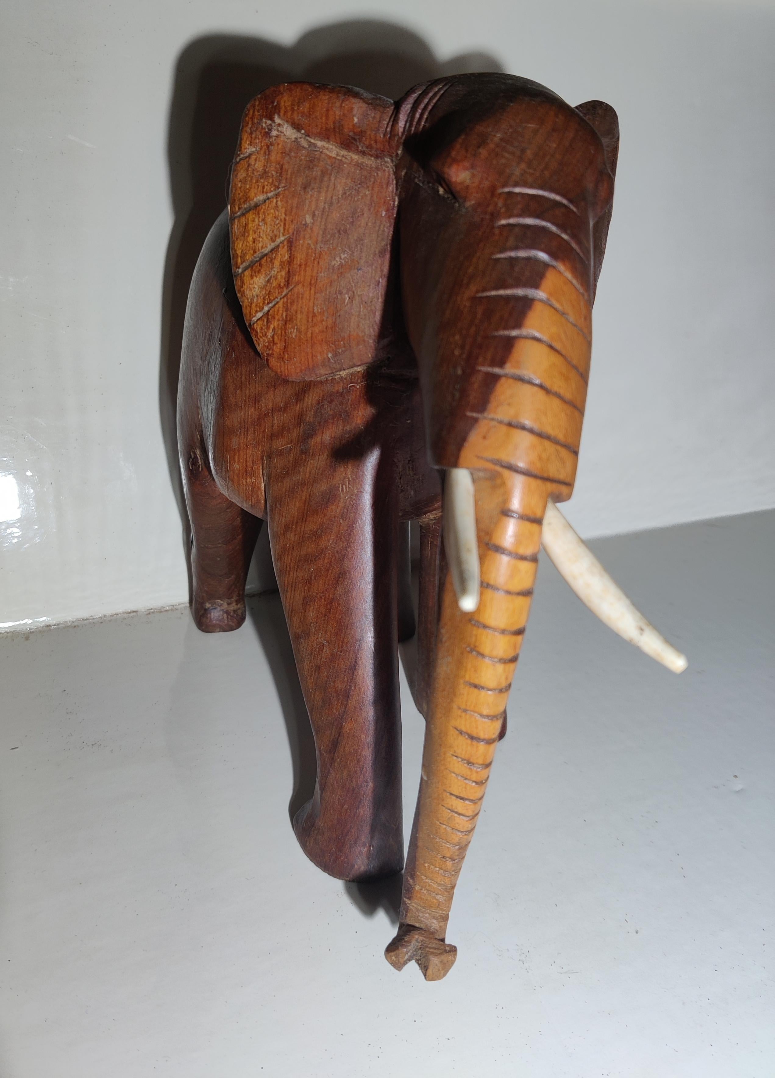 African Heavy Wood Carved Elephant with Tusks For Sale 9
