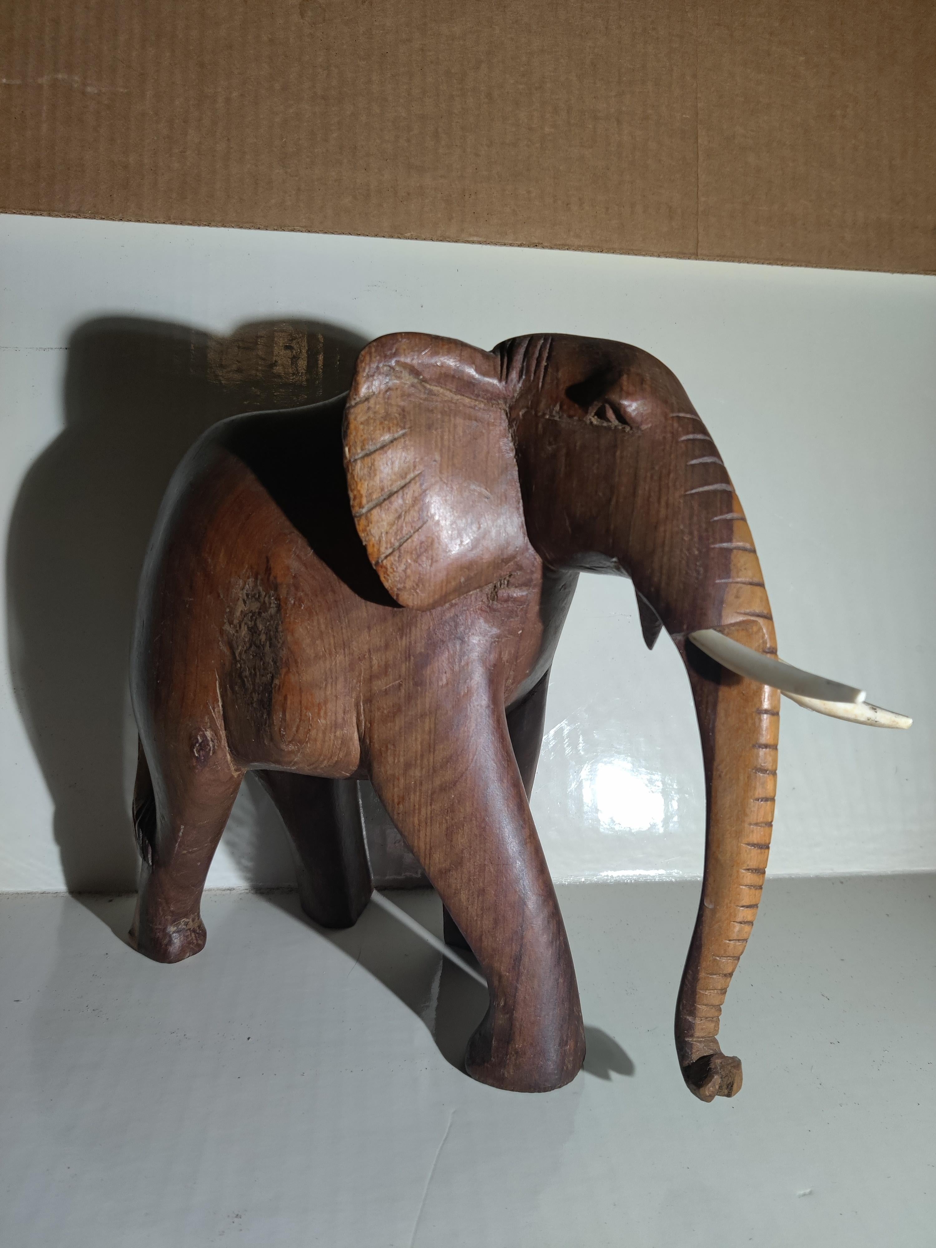 African Heavy Wood Carved Elephant with Tusks For Sale 9