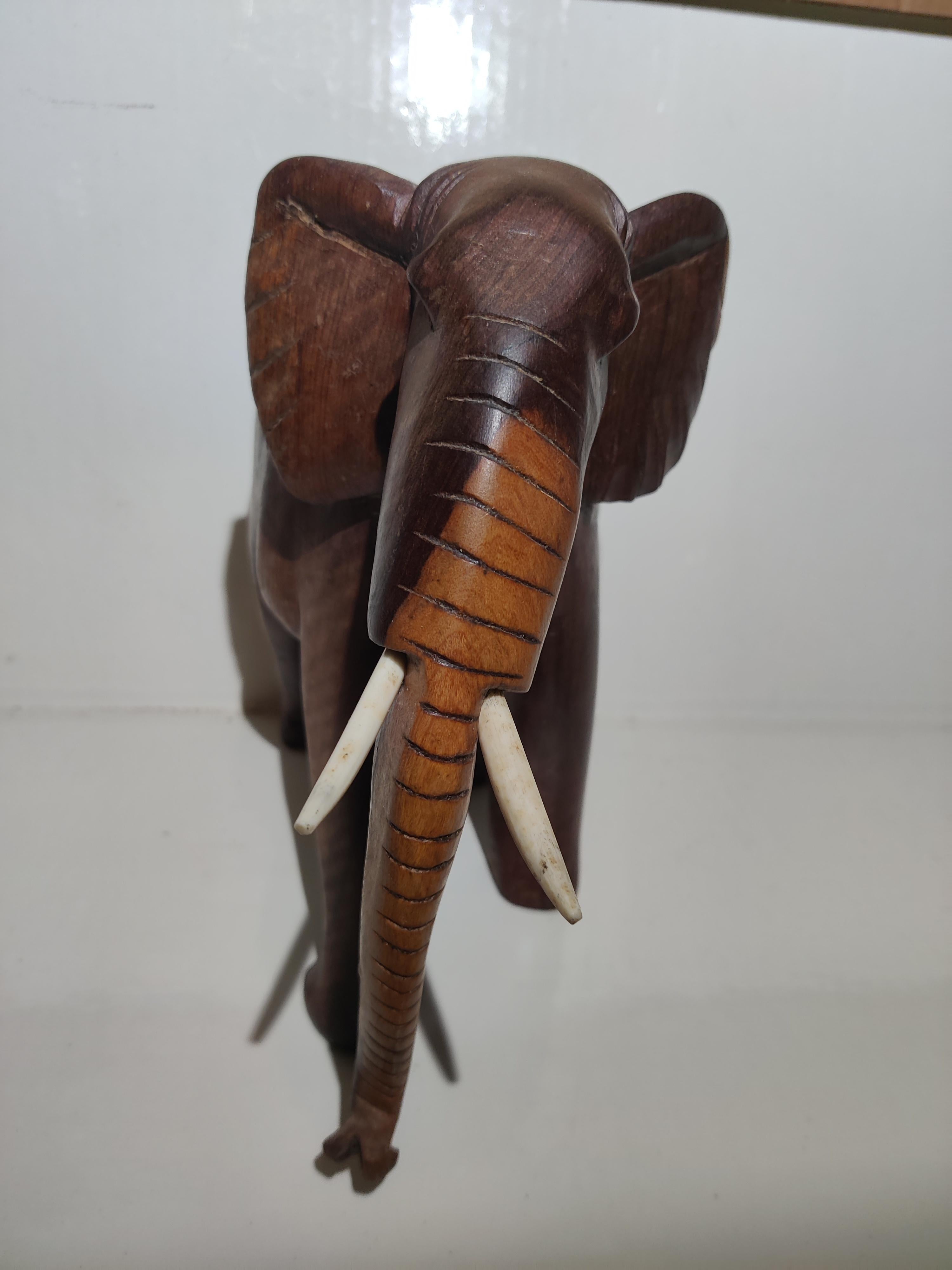 African Heavy Wood Carved Elephant with Tusks For Sale 10