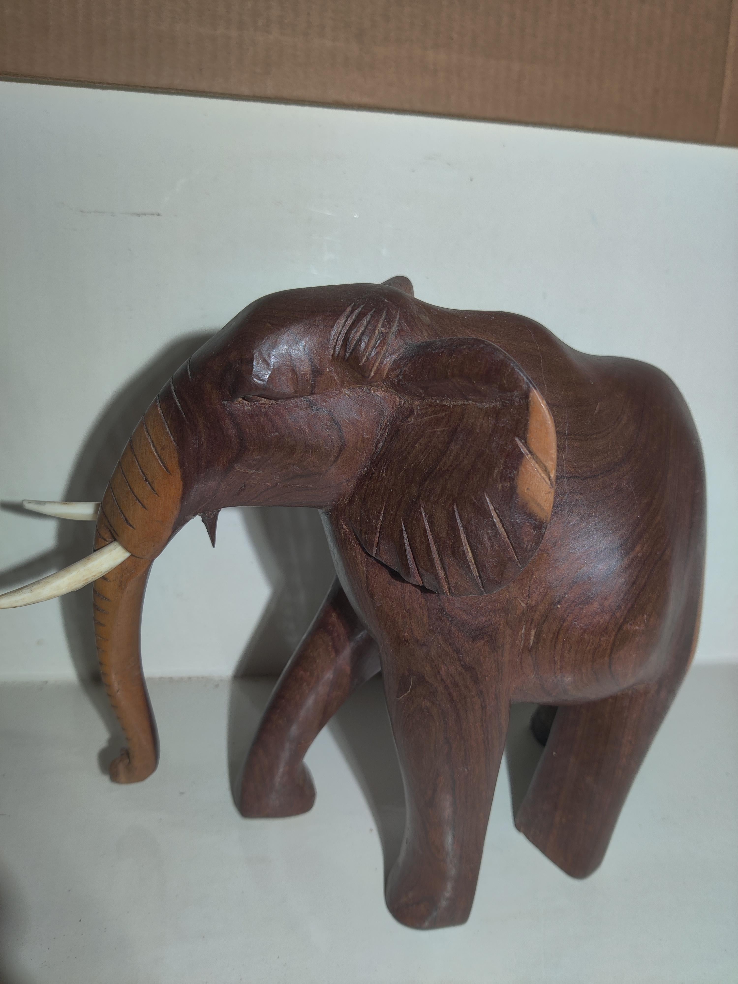 20th Century African Heavy Wood Carved Elephant with Tusks For Sale