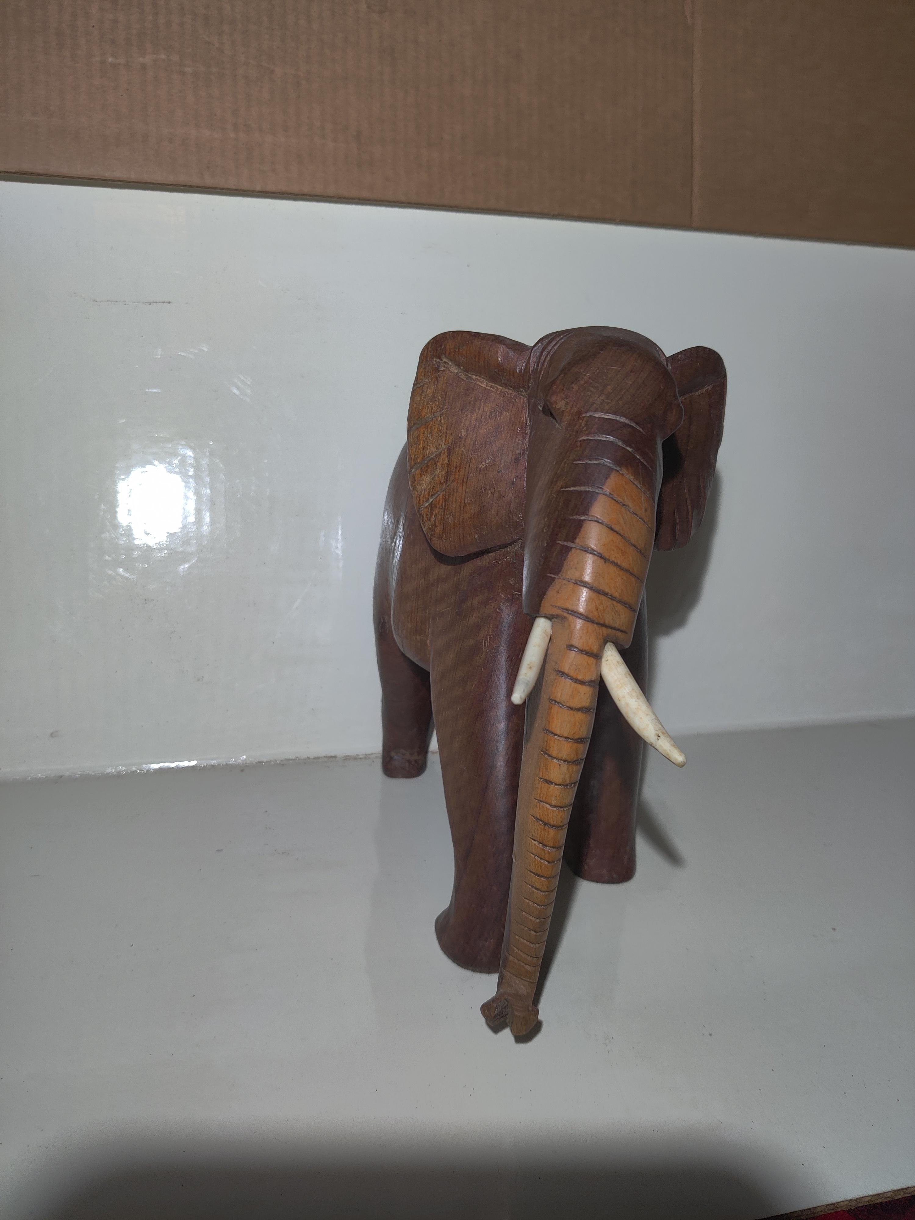 African Heavy Wood Carved Elephant with Tusks For Sale 1