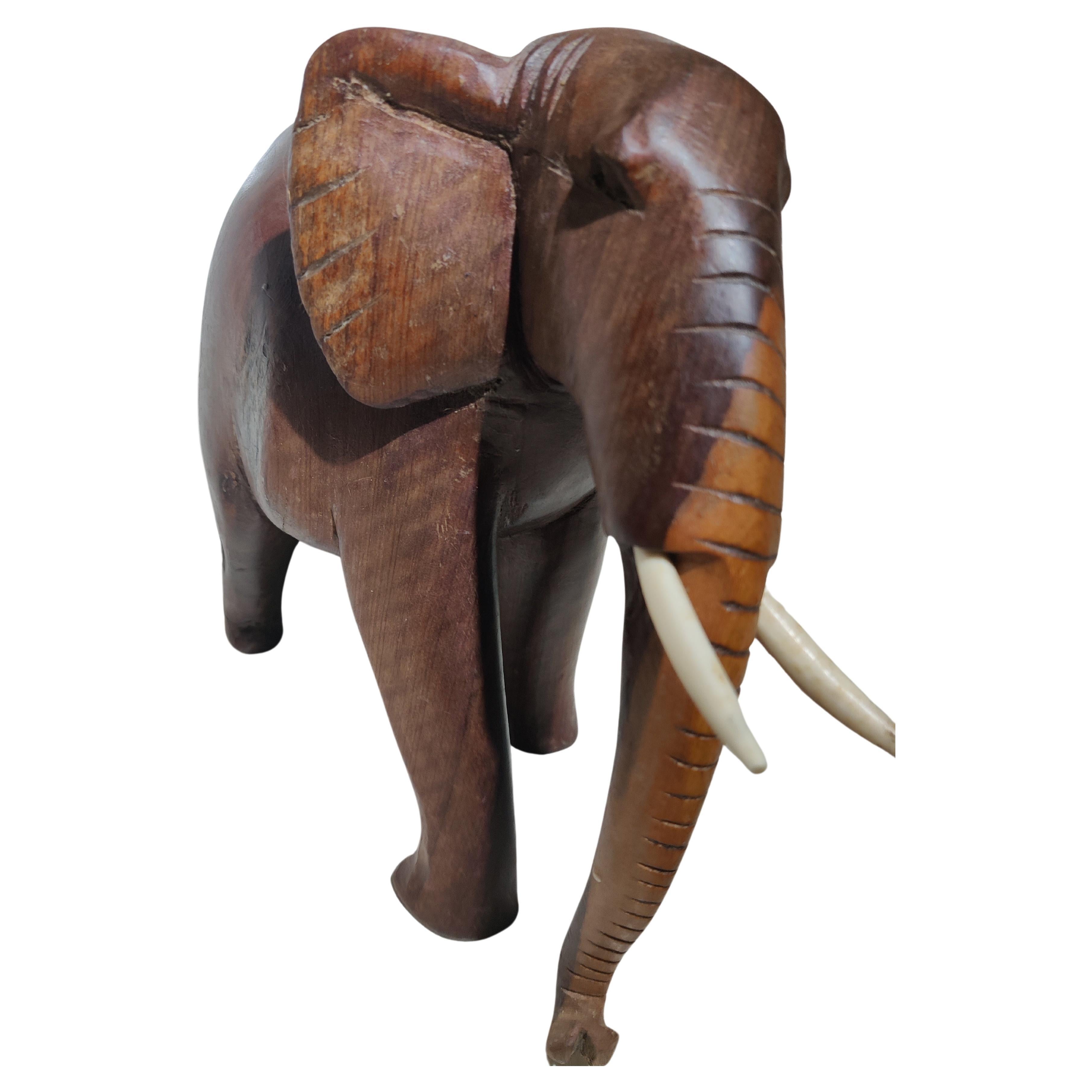 African Heavy Wood Carved Elephant with Tusks For Sale