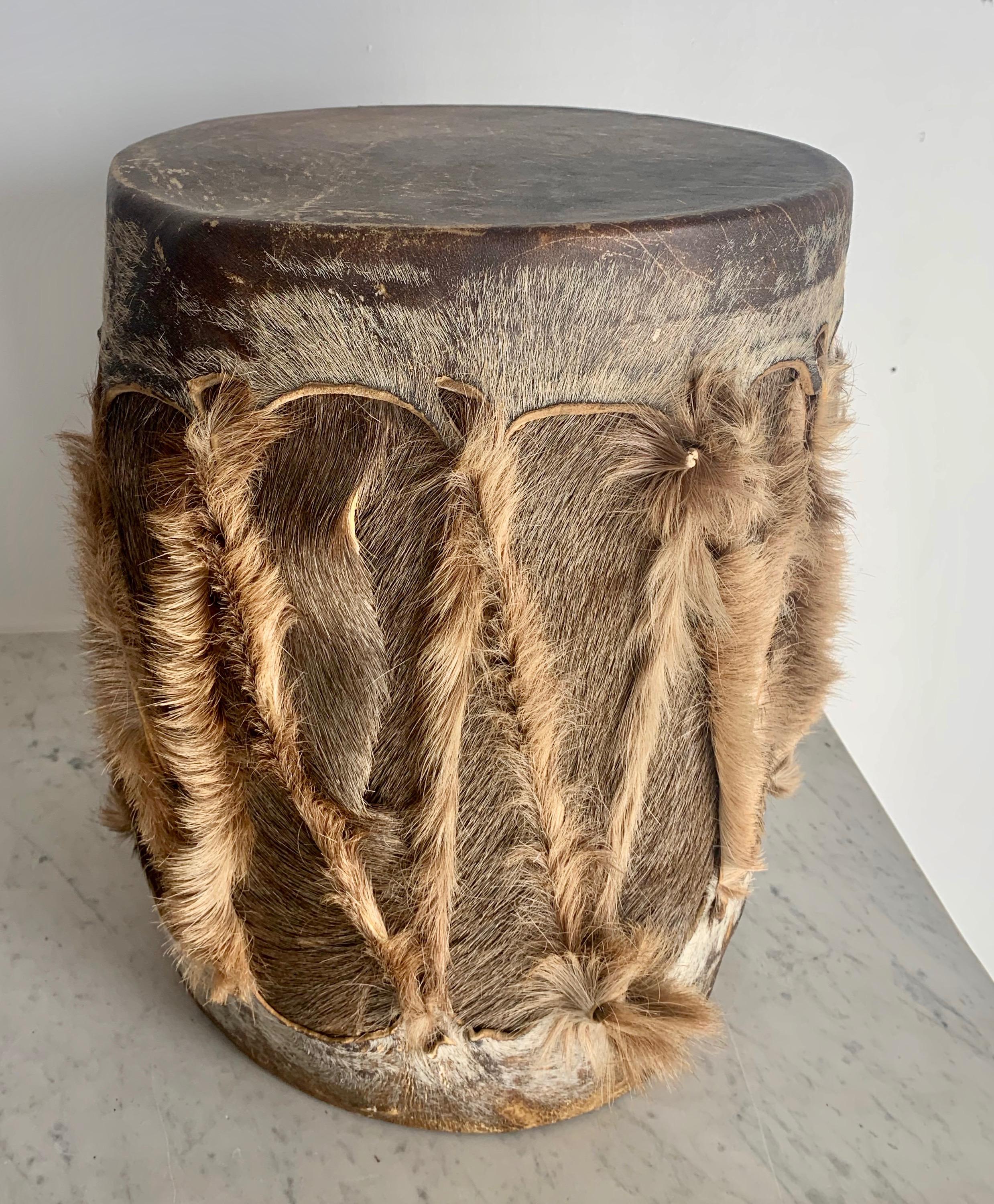 African hide drum, while the drum works it is also a great decorative piece for any room that needs a bit of texture or ethnicity, a wonderful piece also for the Childs room.