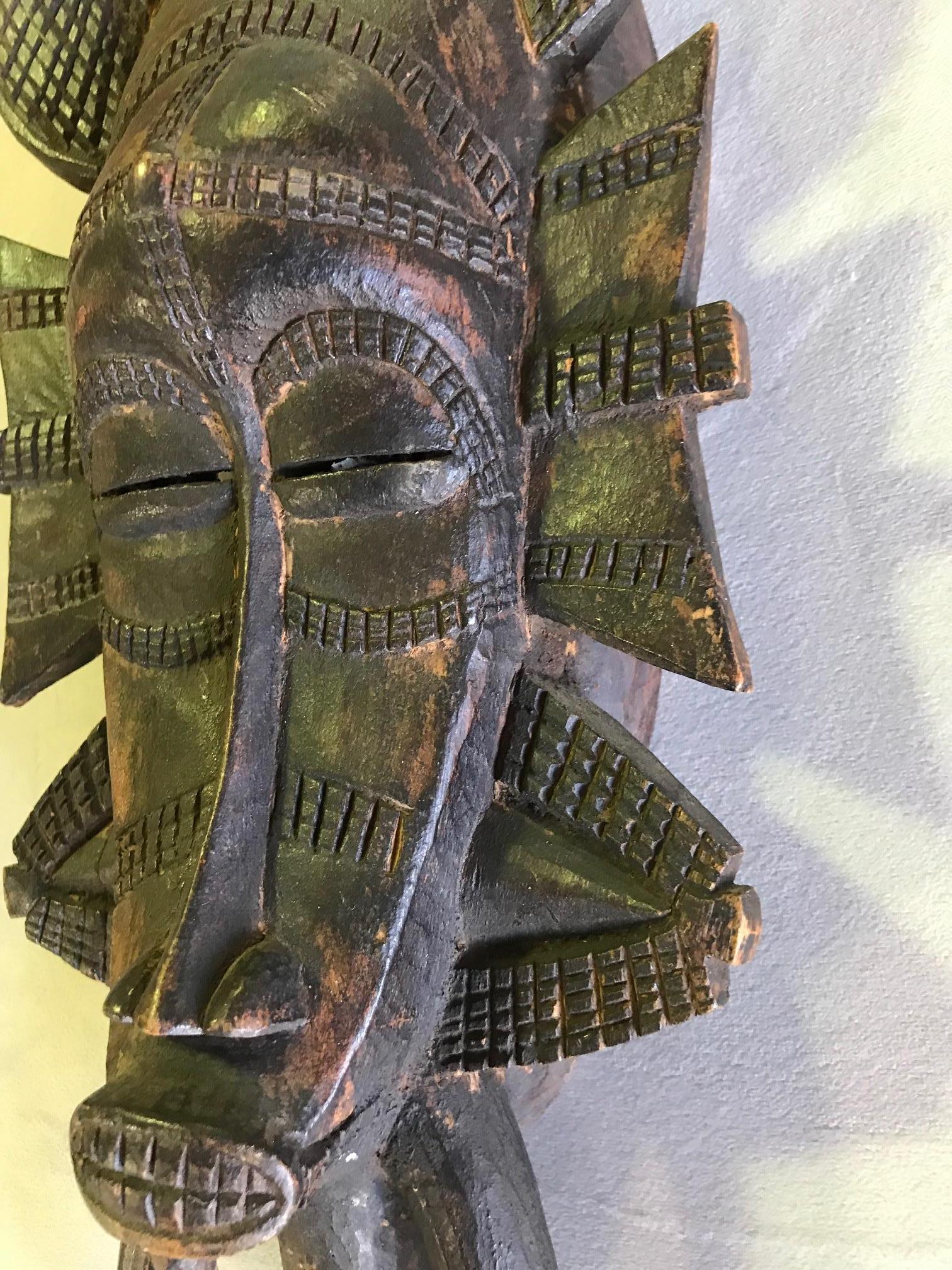 African Intricately Carved Senufo Tribe Kpeliye Kpelie Kpeliyee Mask In Good Condition In Studio City, CA