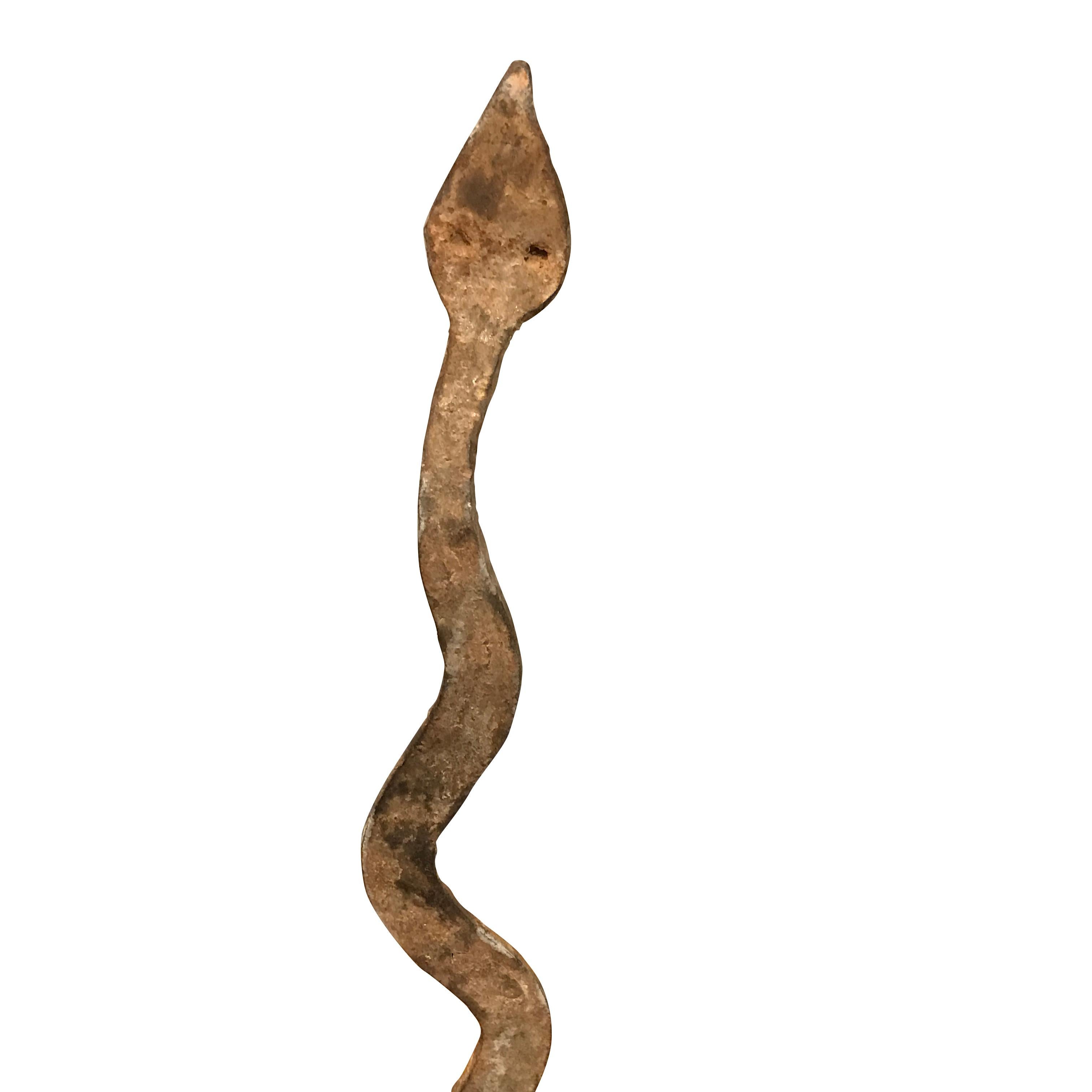 19th century iron snake sculpture on metal stand from the Lobi tribe in Burkina Faso, Africa
Naturally aged patina
Makes a great collection with S4590/91/92
Stand is steel and measures 3