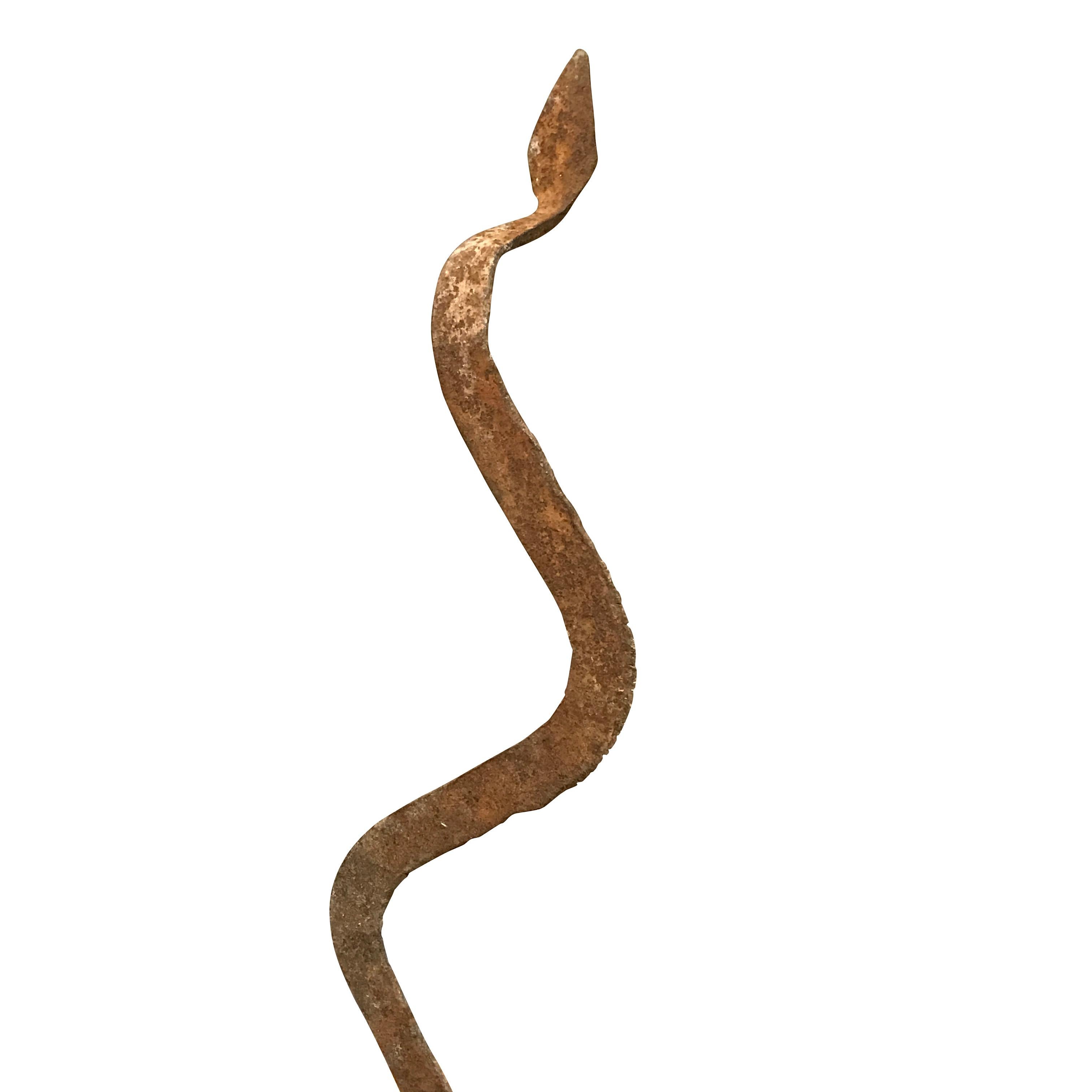 19th century iron snake sculpture on metal stand from the Lobi tribe in Burkina Faso, Africa
Naturally aged patina
Makes a great collection with S4589/91/92
Stand is steel and measures 4.75