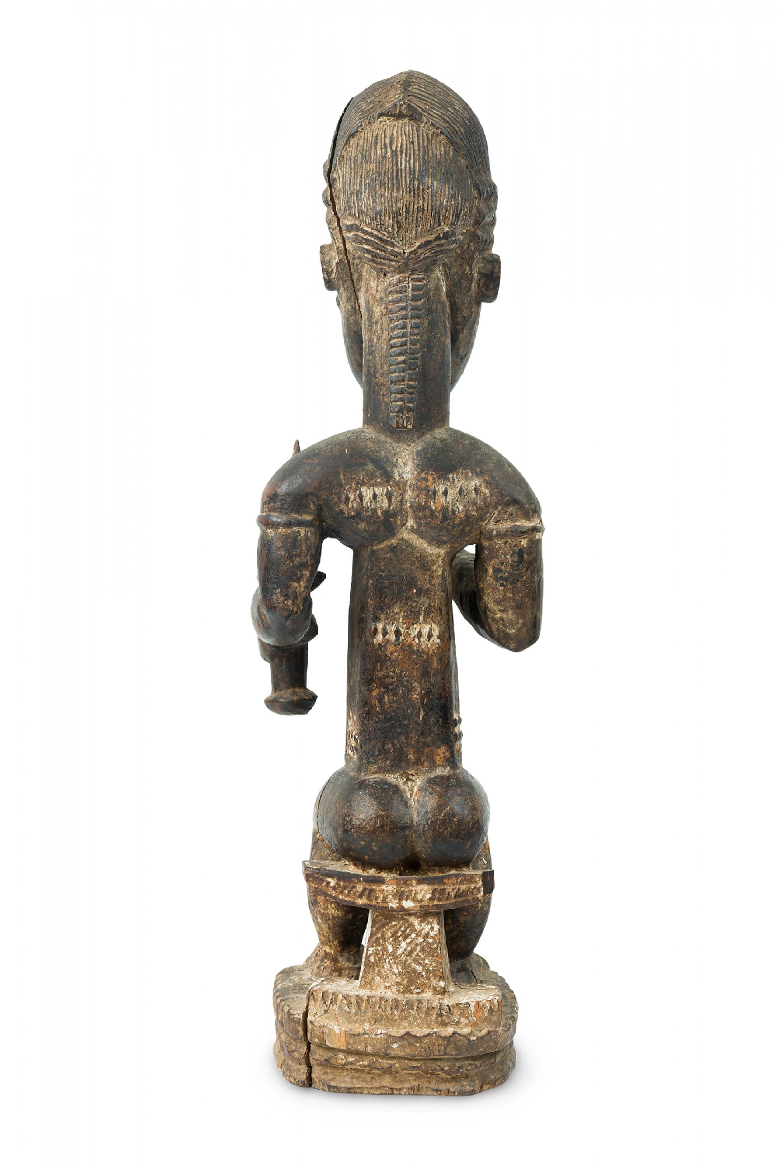 Africano African Ivory Coast 20th Century Carved Wood Baule Diviner Seated Figure in vendita