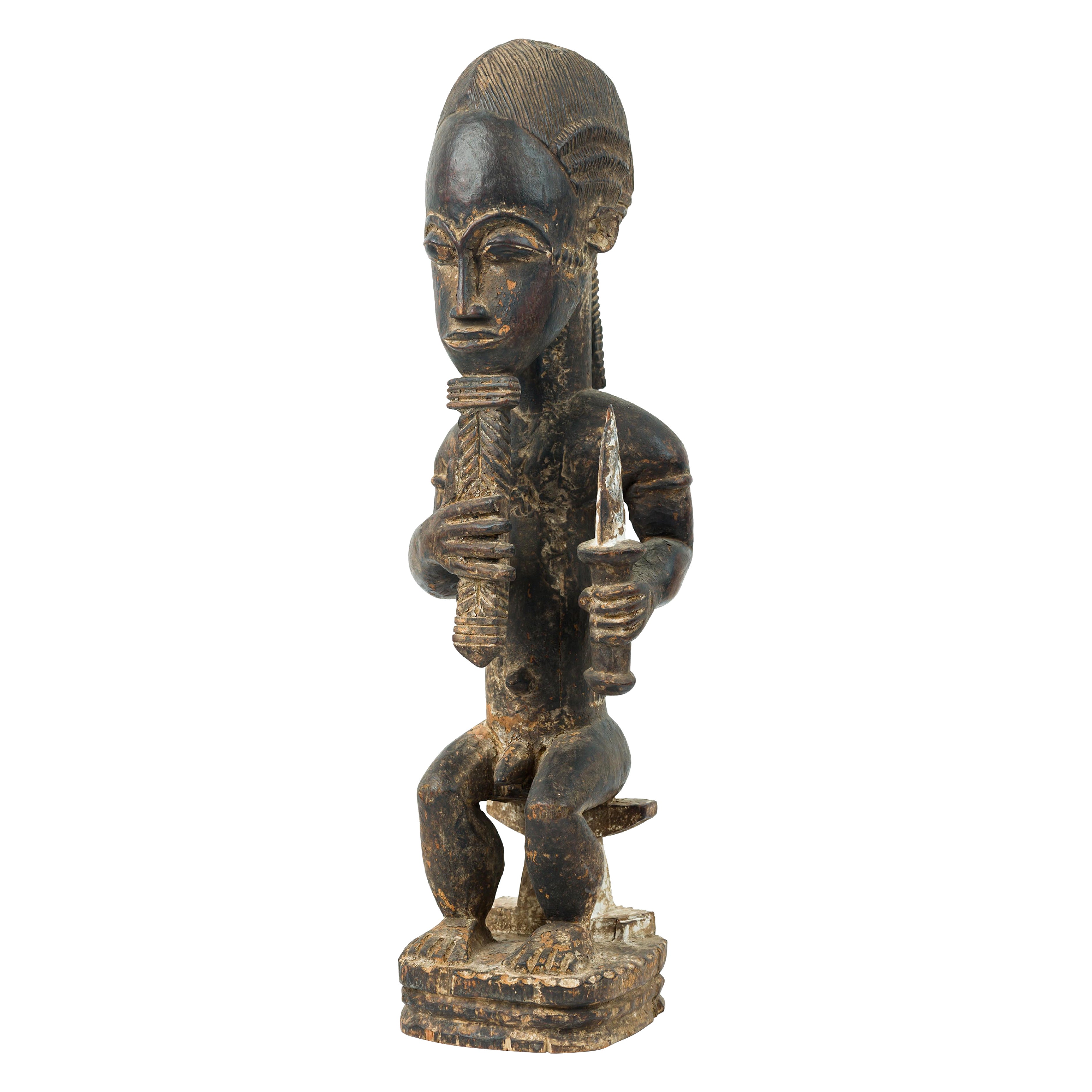 African Ivory Coast 20th Century Carved Wood Baule Diviner Seated Figure in vendita