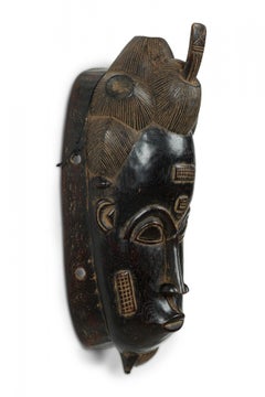 African Ivory Coast 20th Century Carved Wood Baule Male Face Mask