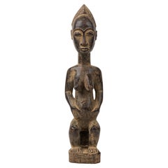 African Ivory Coast Late 20th Century Baule Seated Female Fertility Figure