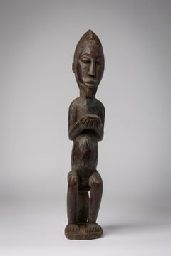 Figura de madera africana de Costa de Marfil de hombre con cuenco