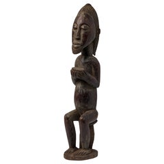 African Ivory Coast Wooden Figure of Male with Bowl