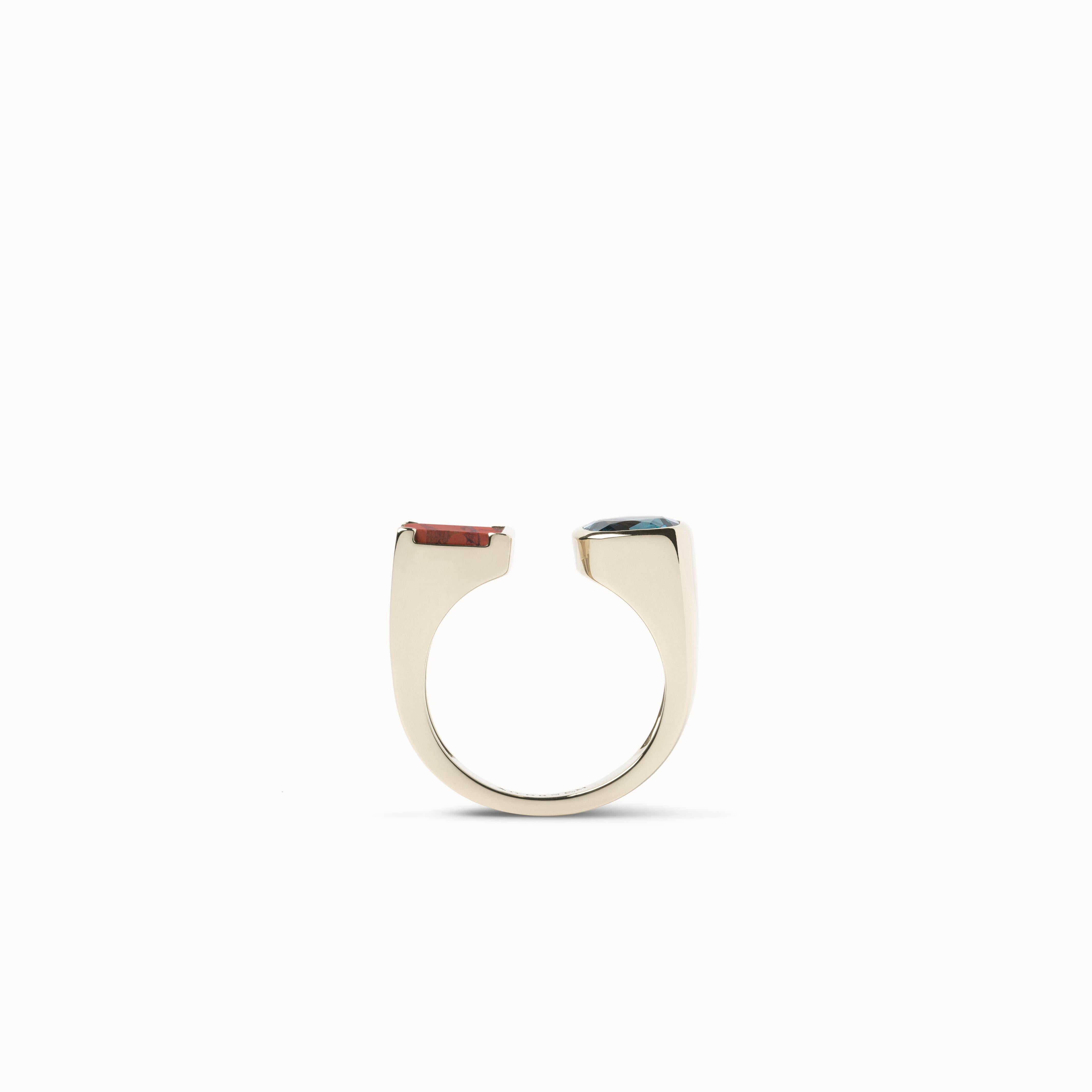 NOS RING

NOS is our jewel metaphor for love, as a modern rework of the traditional « Toi & Moi » ring.

The inner duality of this style is enhanced by an asymetrical design and daring associations of cristalline and ornamental stones, which are