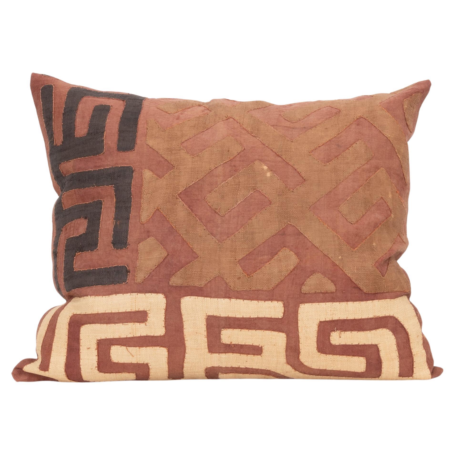 What is Kuba cloth made from?