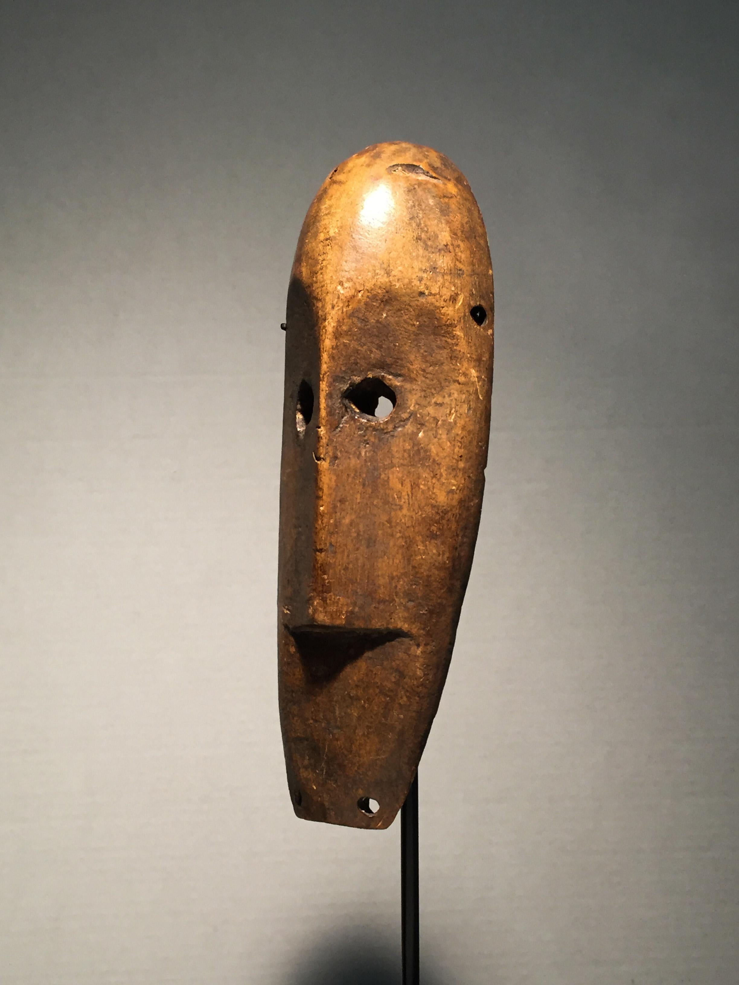African mask from the Lengola people of the Democratic Republic of the Congo used in ceremonies of the Bwami secret society, ex collection James Stephenson, New York, NY.