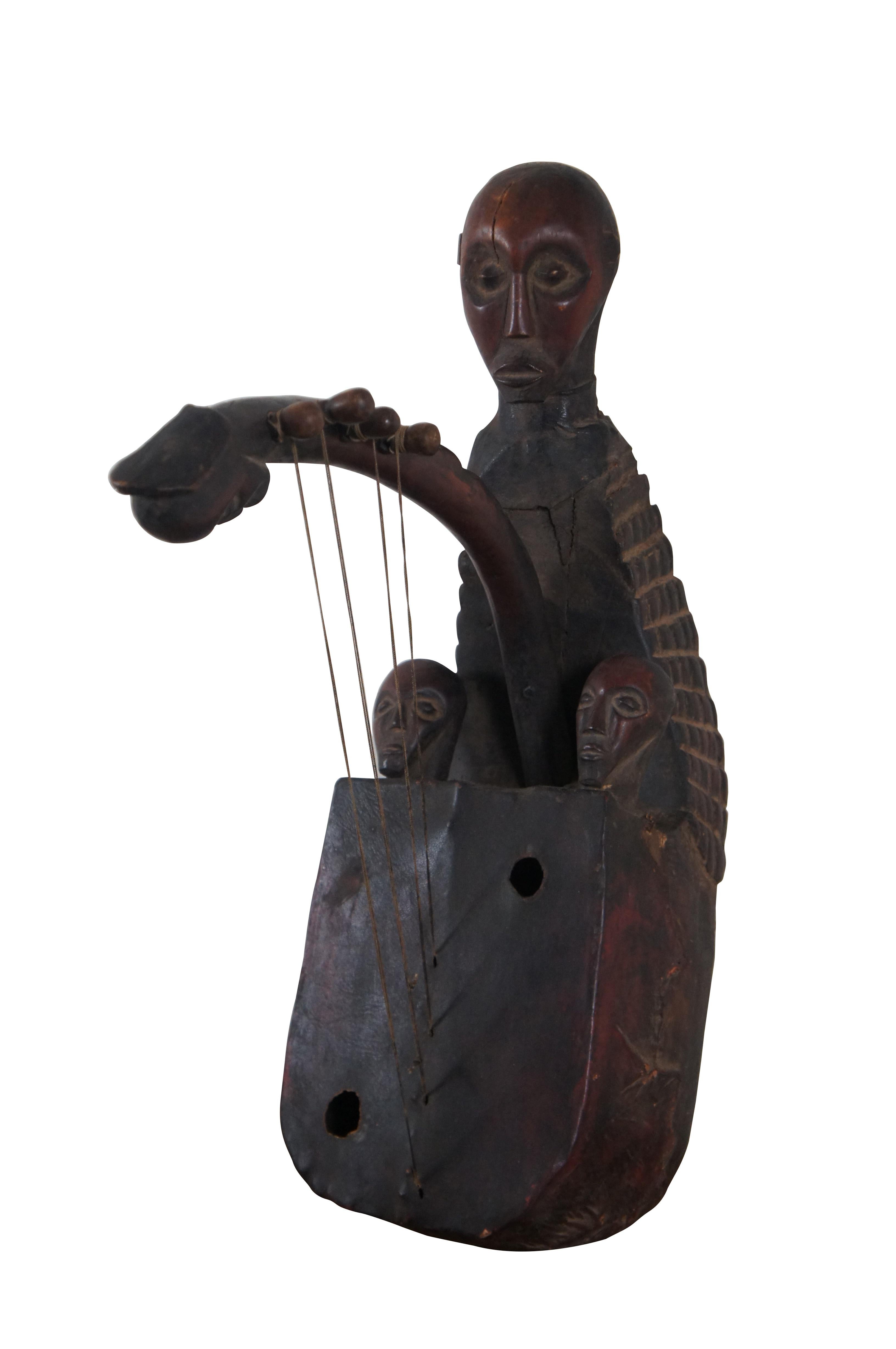 Afrikanische Mangbetu geschnitzte figurale Fruchtbarkeitsschleife Domu Instrument 27