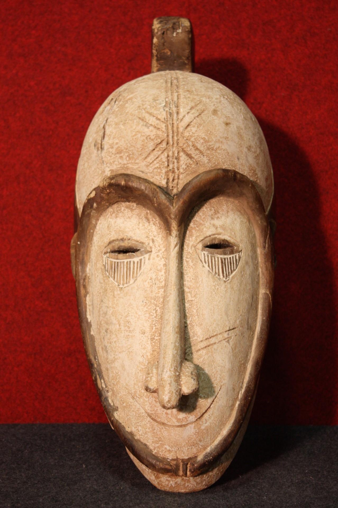 African Mask Carved in Wood, 20th Century For Sale 7