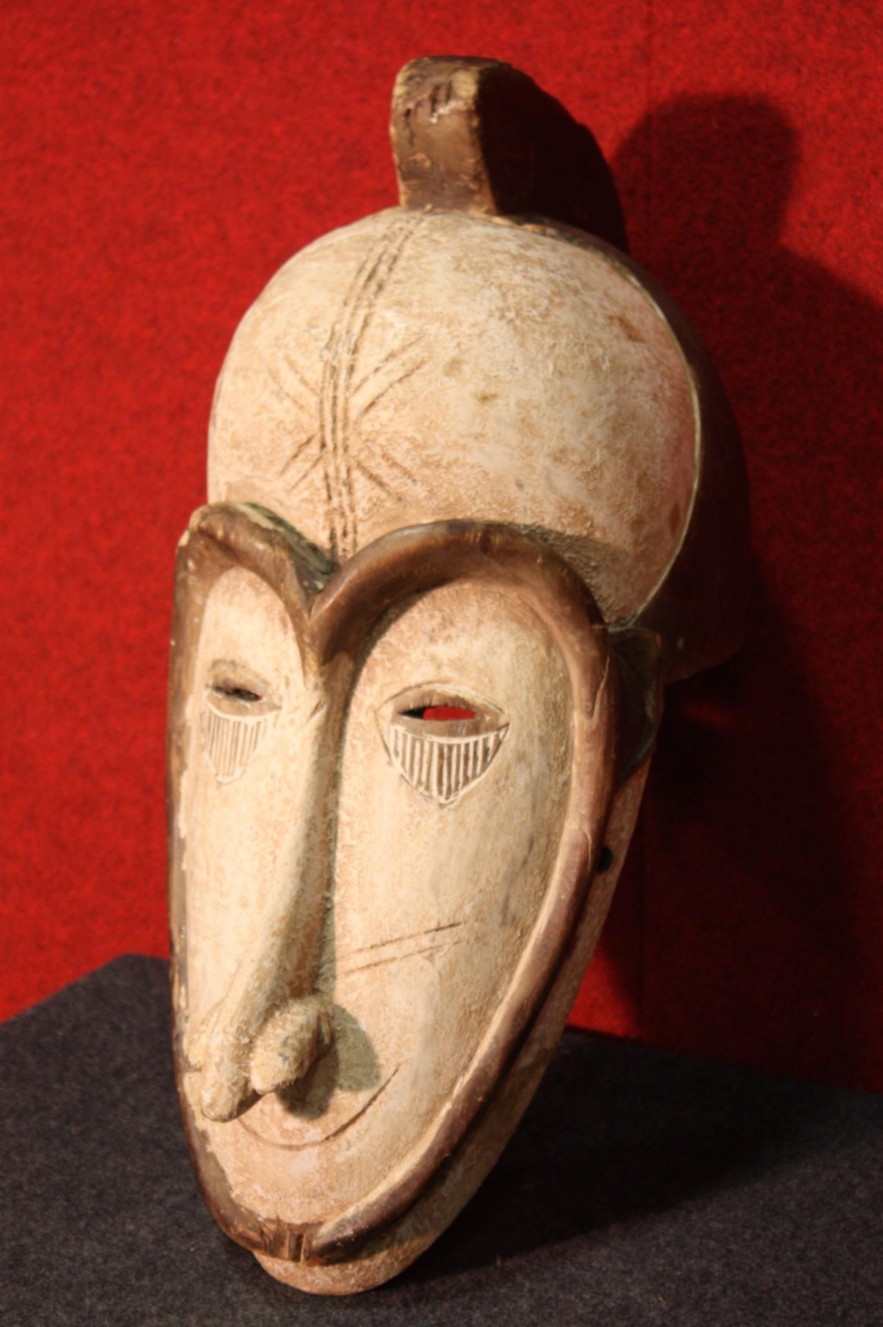 African Mask Carved in Wood, 20th Century For Sale 9