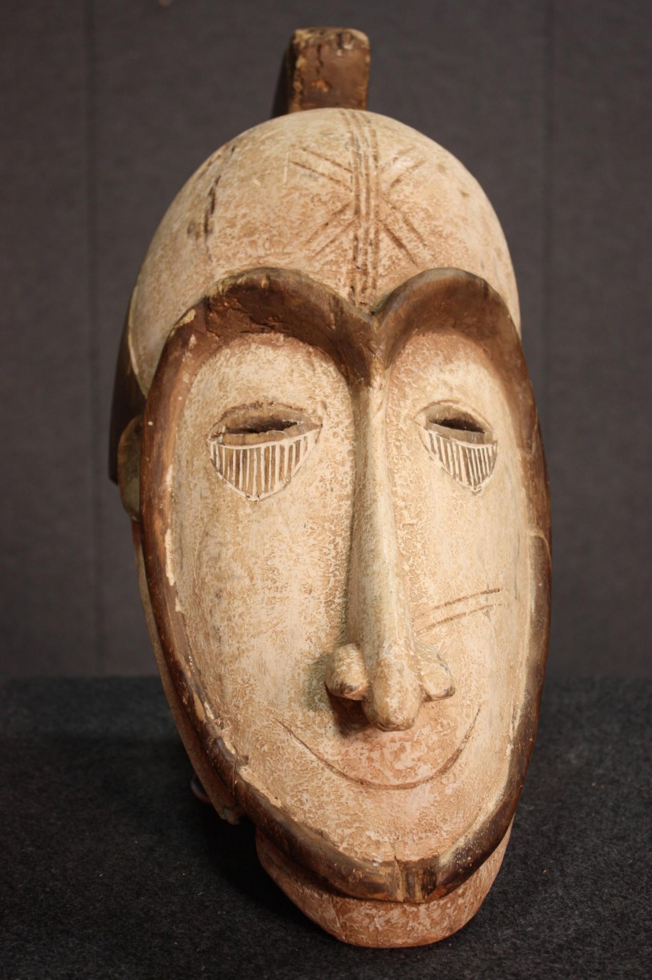 African Mask Carved in Wood, 20th Century In Good Condition For Sale In London, GB