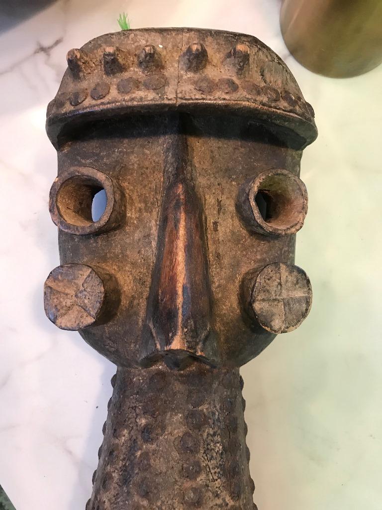 Strange and unusual piece. Likely Grebo Tribe of the ivory coast. Good size and heft. Nice, rich patina. Ready for hanging. Sure to stand out.

From a collector of African artifacts.

Dimensions: 13